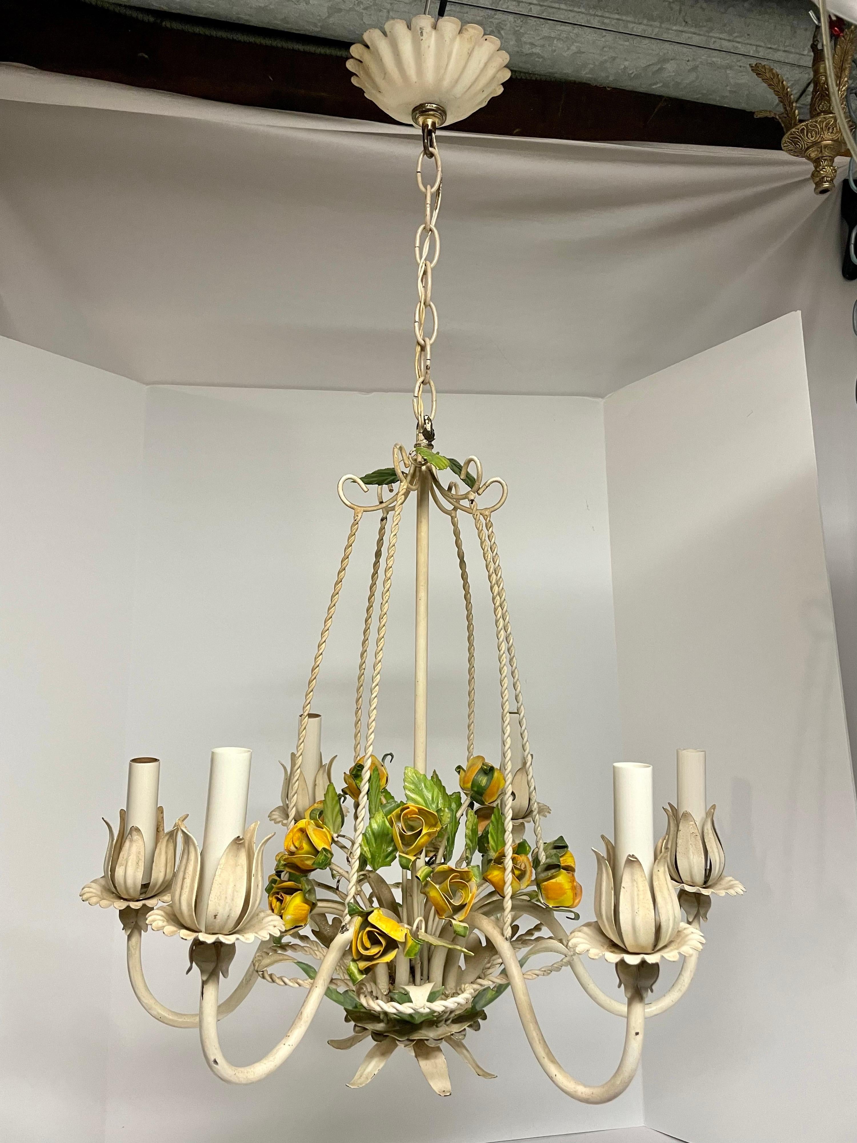 Hollywood Regency tole floral chandelier with roses. Original ceiling cap. Made in Italy tag. Six arms. Measures 20