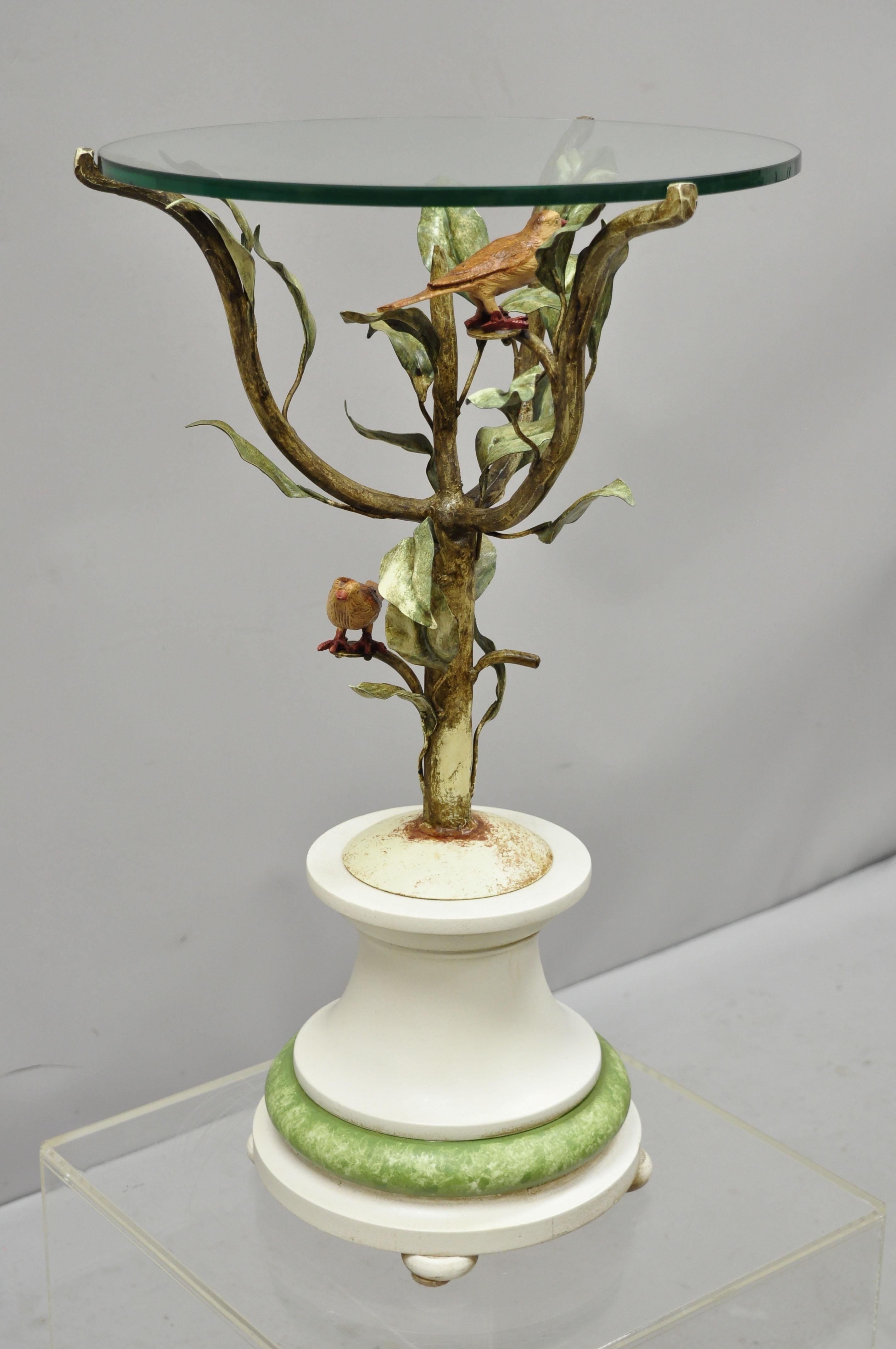 Vintage Italian toleware bird and tree round glass top accent side table. Item features iron toleware painted tree form base with birds, wooden base, round glass top, great style and form, circa mid-20th century. Measurements: 26