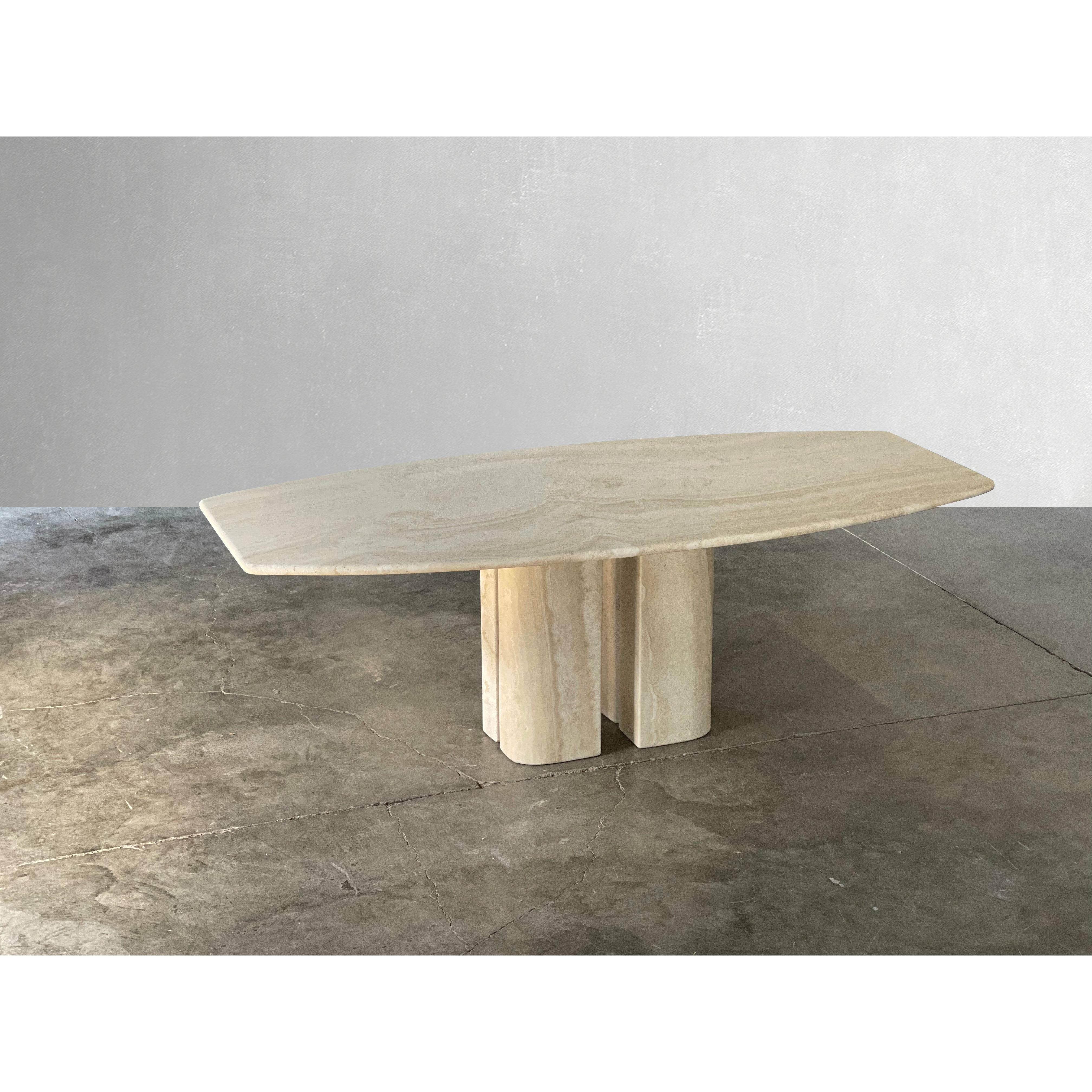Vintage Italian Travertine dining table with Sculptural Bases

C.1980 by Maurice Villency for Roche Bobois

Oversized travertine table that can seat 8-10 comfortably. This table is one of the larger travertine tables we have come across. The
