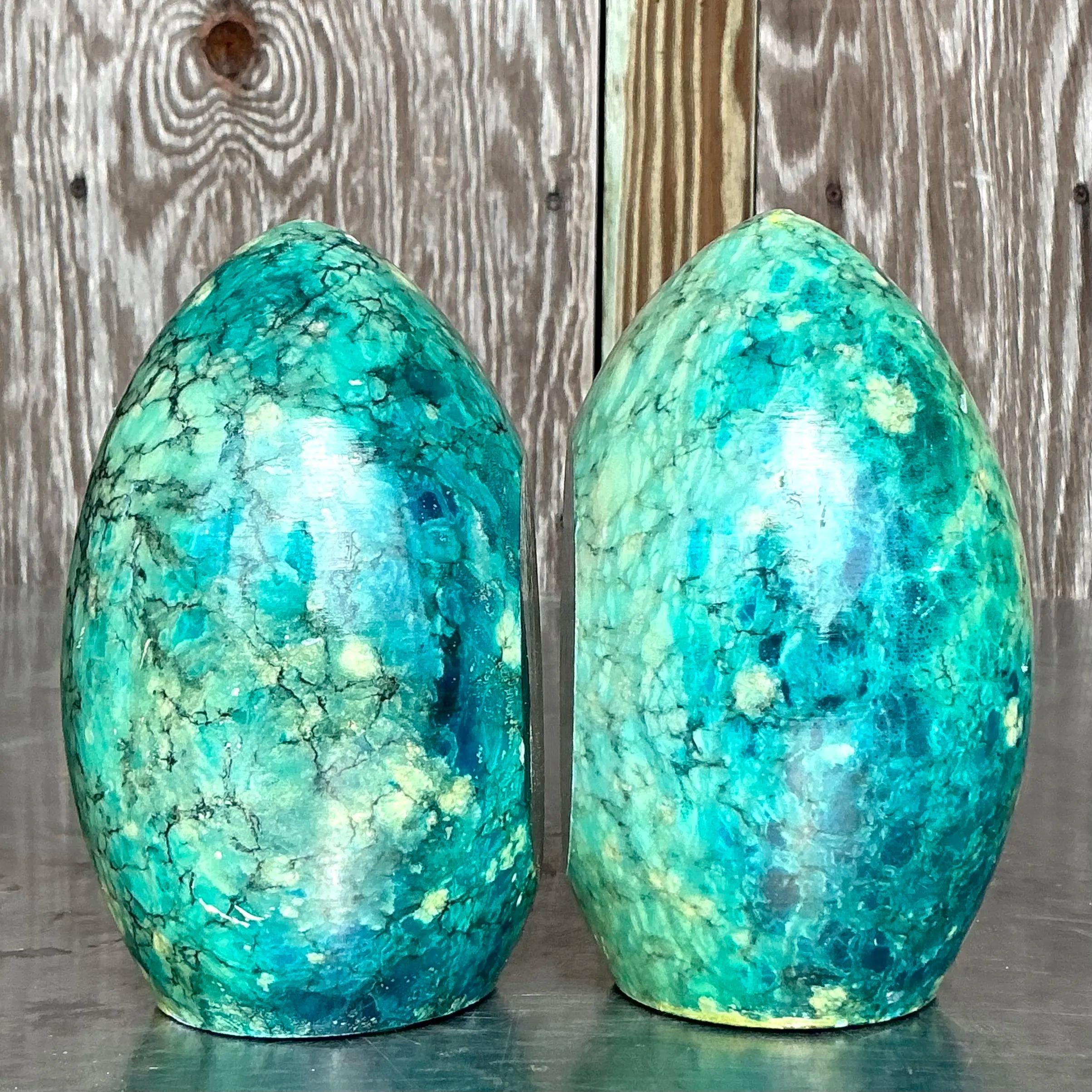 This exquisite pair of vintage Italian bookends is crafted from vibrant turquoise alabaster, showcasing their polished surfaces and natural stone veining. The geometric design exudes timeless elegance, making them both functional and decorative