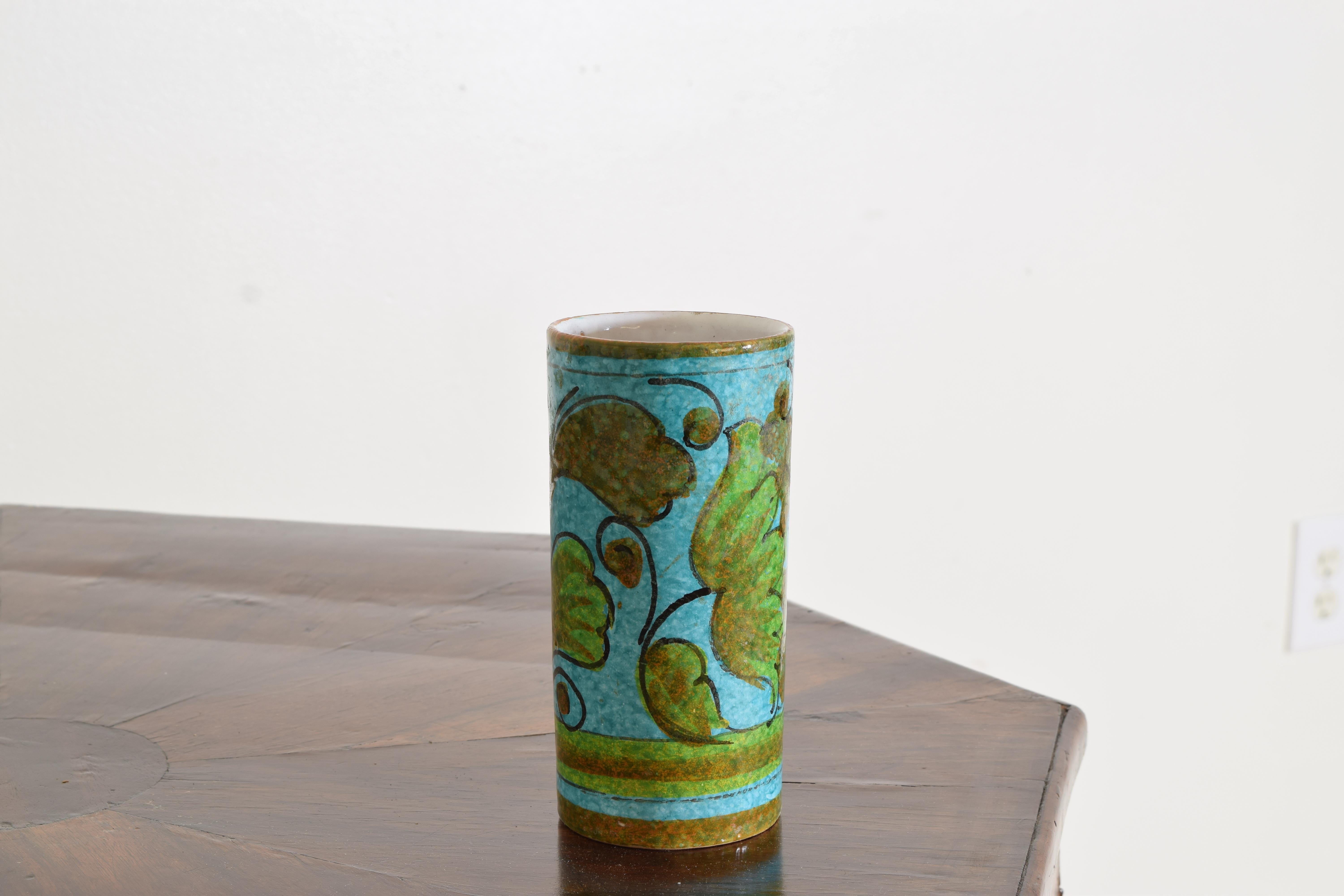Featuring a beautiful mottled turquoise blue with earthtone-colored foliage and a white glazed interior
Hand-formed, painted, and glazed

