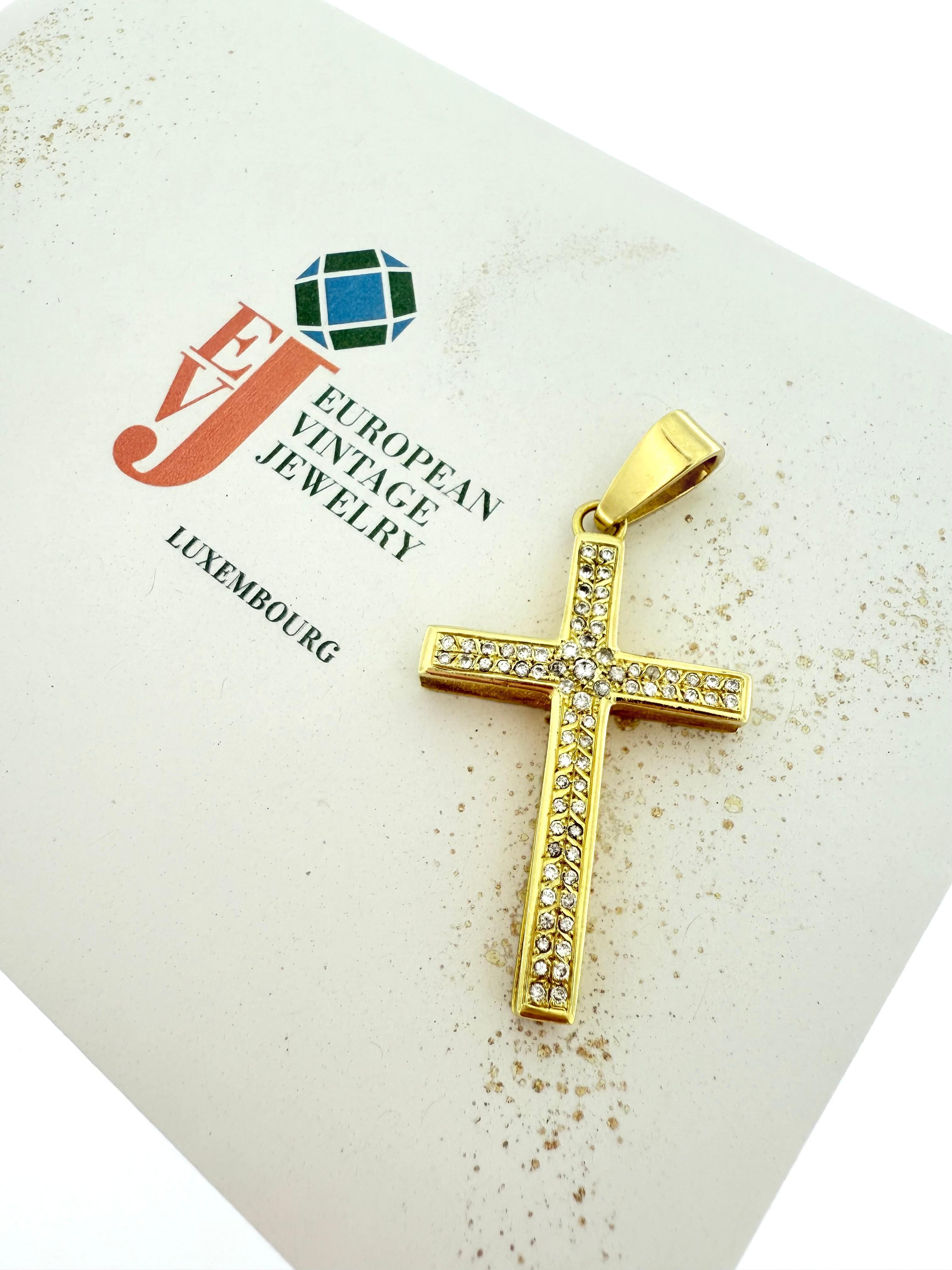 Large bail : 0.7cm
Chain not included

This exquisite vintage Italian two-faced cross pendant is a timeless expression of elegance and craftsmanship, crafted from 18kt yellow gold with a radiant and warm finish. The design features intricate details