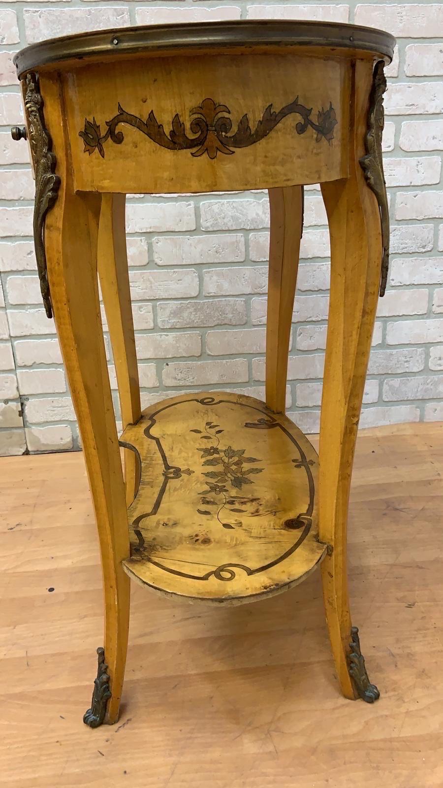 Vintage Italian Two Tier Inlaid Side Table

This Vintage Italian Inlaid Side Table features a sophisticated two-tier design, providing both style and functionality. The elegant curved legs, adorned with ferrules, enhance its classic appeal, while