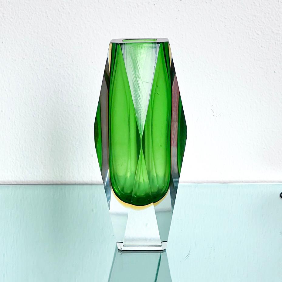 Decorative Murano Vase - Faceted Glass Vase - Sommerso Murano Glass

Universally regarded as one of the most prolific and capable designers of Murano glass vases and objects at large, Flavio Poli teamed up with some of the most influential and