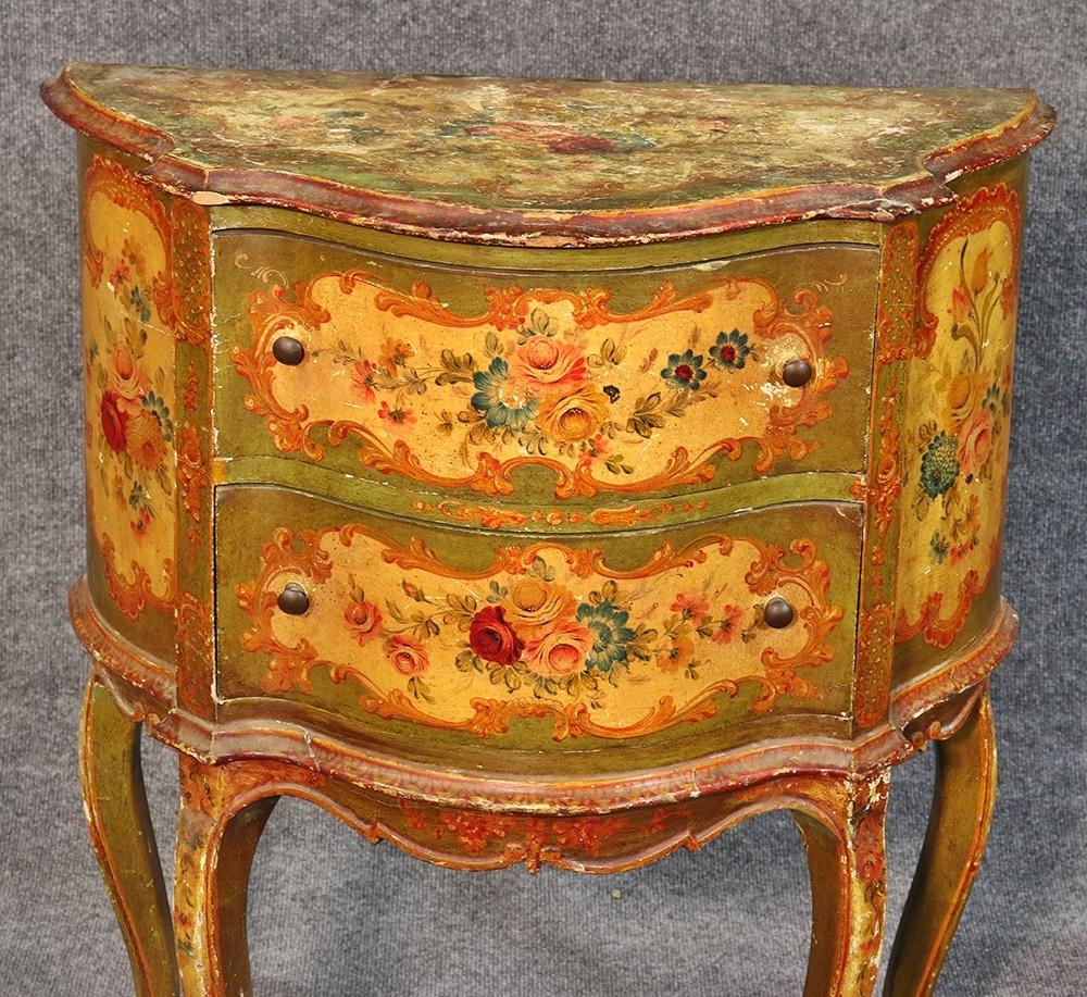 This is a superb, Venetian or Italian paint decorated stand. This beautiful stand has the typical distressing they always have. The colors are as beautiful as is the painted floral decoration. Dates to the 1930s.