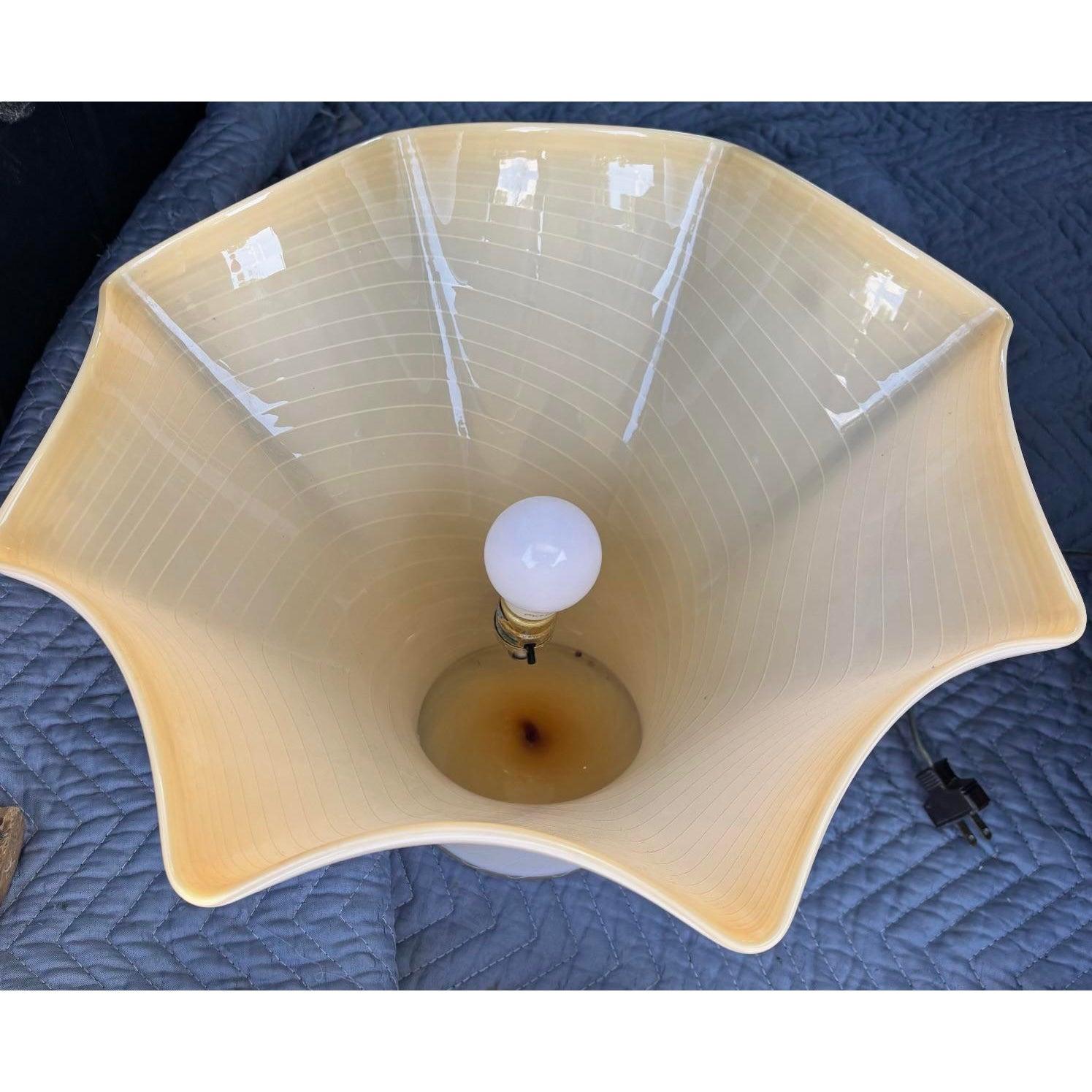 Illuminate your space with a dazzling piece of Italian artistry — this Vintage Vetri Murano Glass Handkerchief Lamp captures the timeless beauty and craftsmanship for which Murano glass is world-renowned. Featuring a sculptural handkerchief design