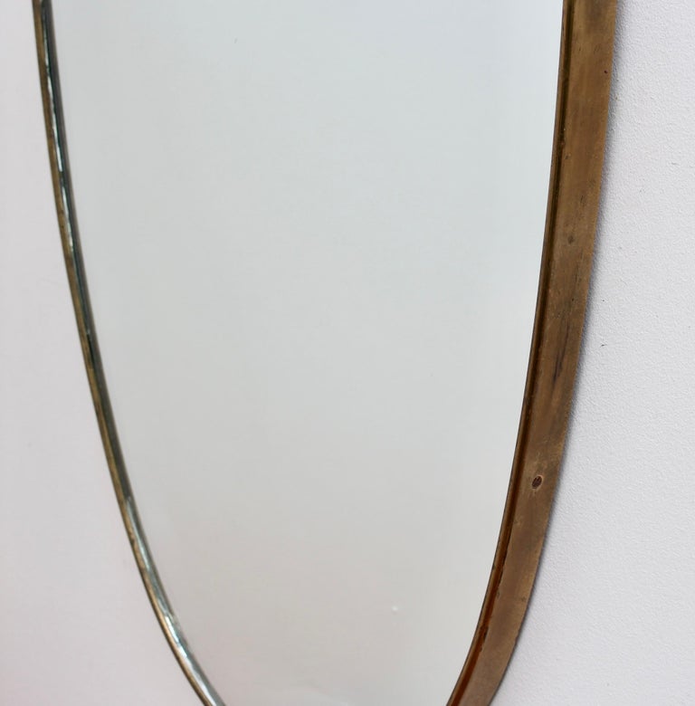 Vintage Italian Wall Mirror with Brass Frame and Top Flourish (circa