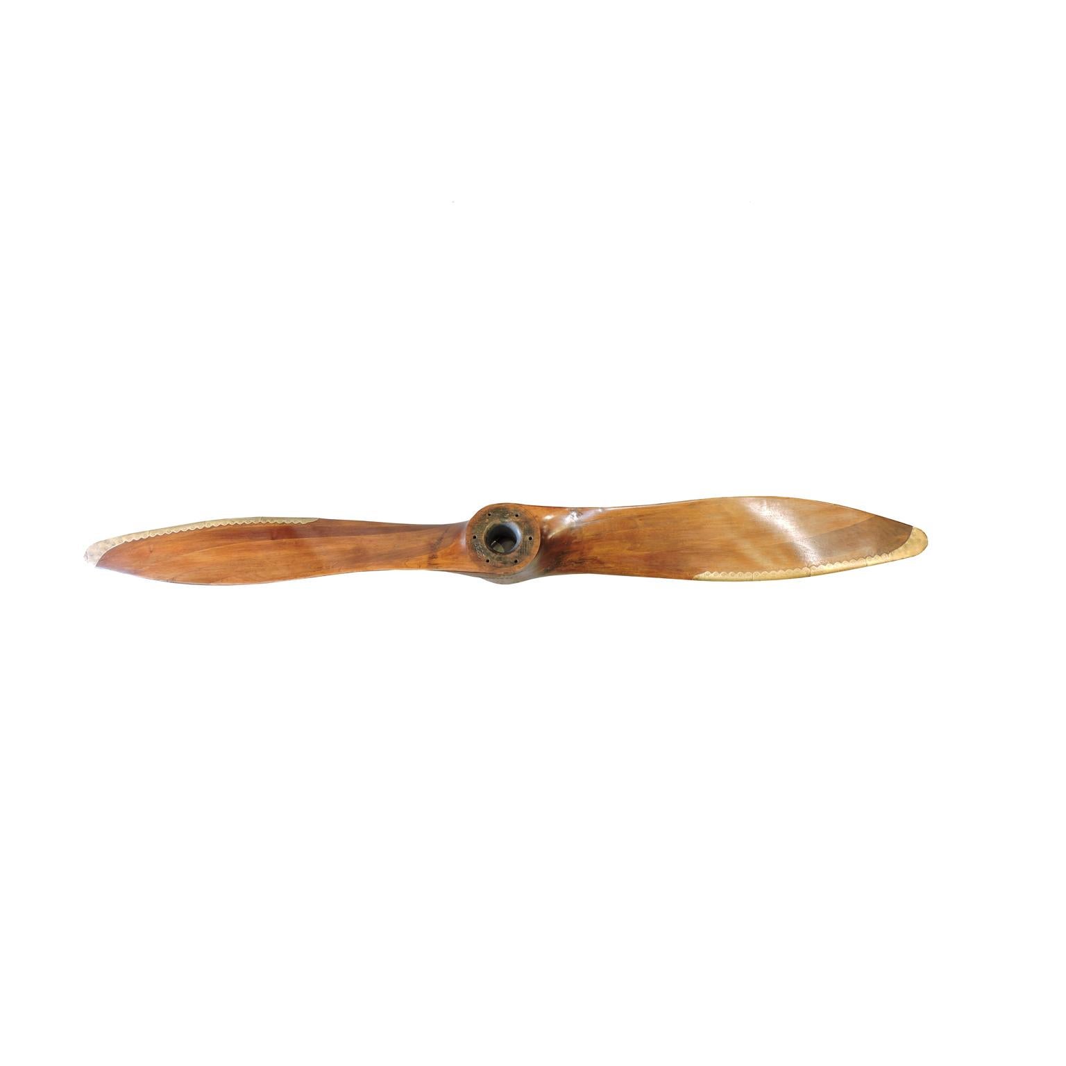 Walnut multilayer lamellar propeller with brass side reinforcements and hub with 6 holes, mounted on FIAT A 50 aircraft engine, for Caproni Ca 100 single-engine two-seater biplane produced from 1928 to 1932, airplane known as Caproncino. 209x13.5x21