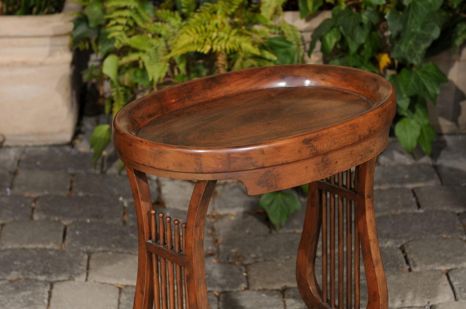 20th Century Vintage Italian Walnut Side Table with Lyre-Shaped Legs and Oval Tray Top For Sale