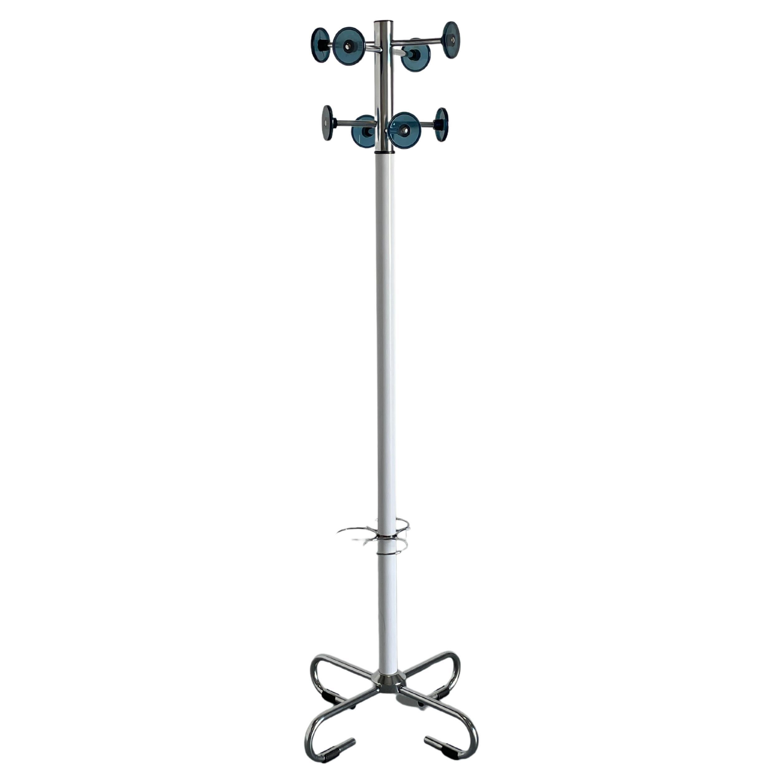 Striking space age vintage coat rack in white finish with chrome stand, umbrella station and hangers with dark blue plastic circular tops. Stemming from Italy, this coat rack would make a brilliant addition to your home (or spaceship).

Aside from a