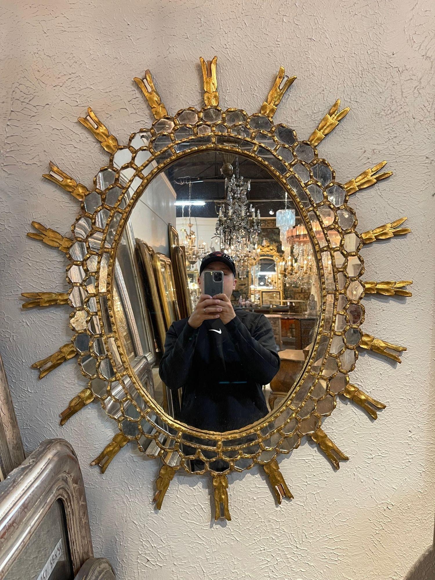 Vintage Italian carved and gilt-wood sunburst mirror. Circa 1940. A fine addition to any home! A favorite of top designers.