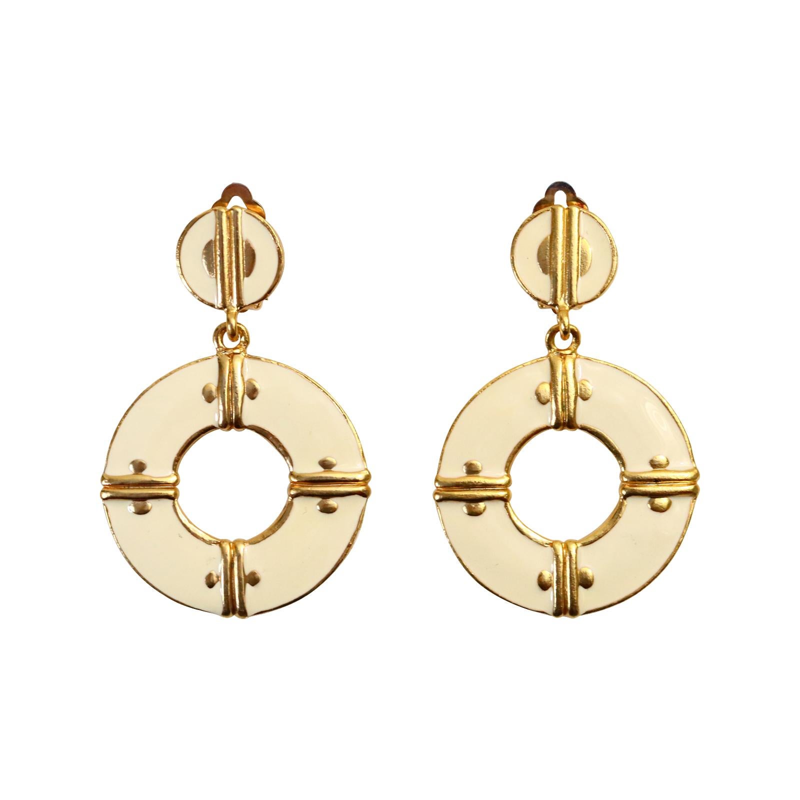 Vintage Ivory Enamel and Gold Dangling Hoop Earrings Circa 1980s.  The hoops are front-facing and dangle from the round piece, so they are always moving forward. These hoops will always be in style. So chic. Clip On.