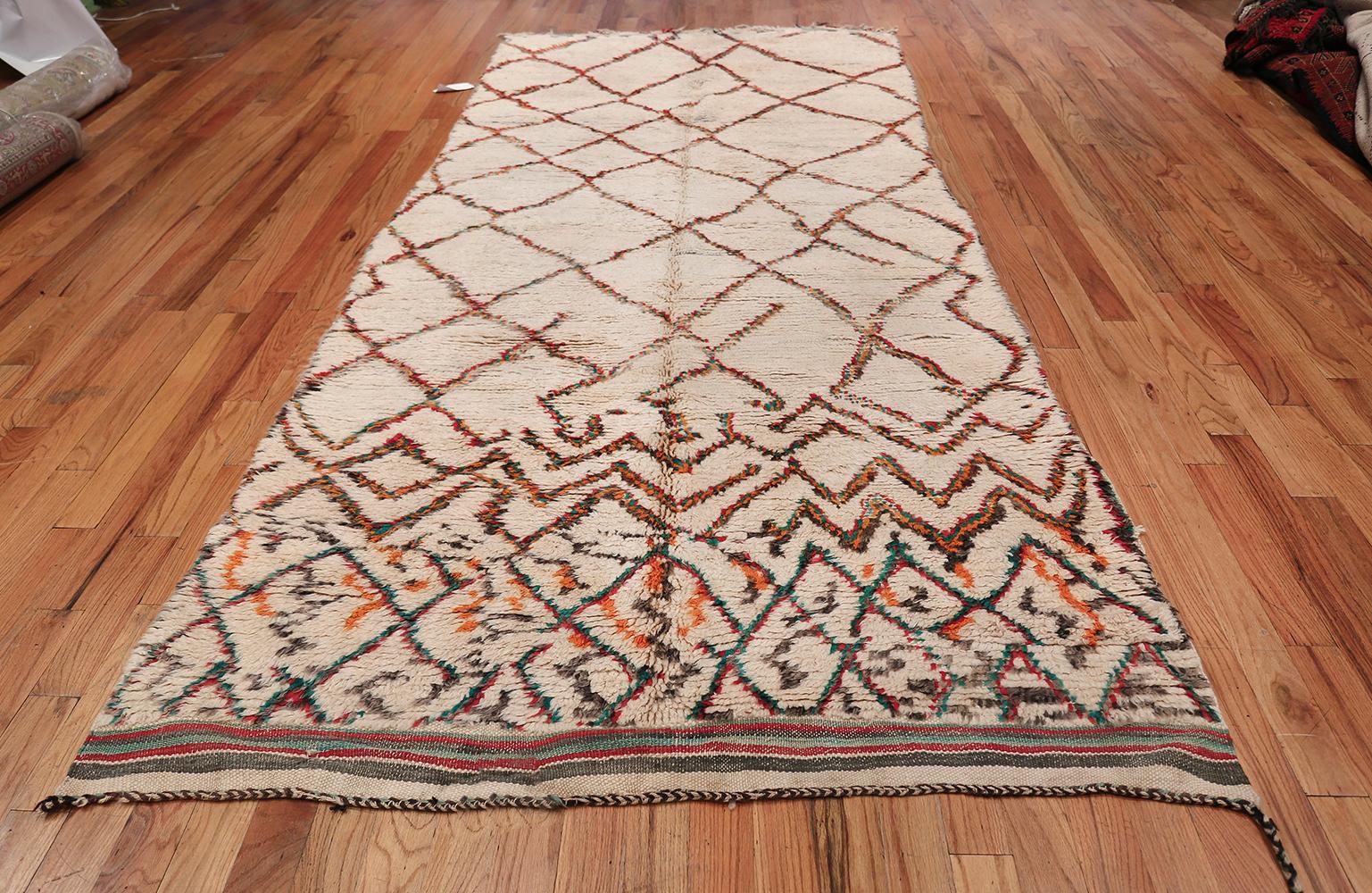 Beautiful And Quite Tribal Vintage Ivory Shag Pile Moroccan Berber Rug, Country of Origin / Rug Type: Morocco, Circa Date: Mid – 20th Century – This beautiful vintage mid century Moroccan rug is an excellent example of the fine weaving and