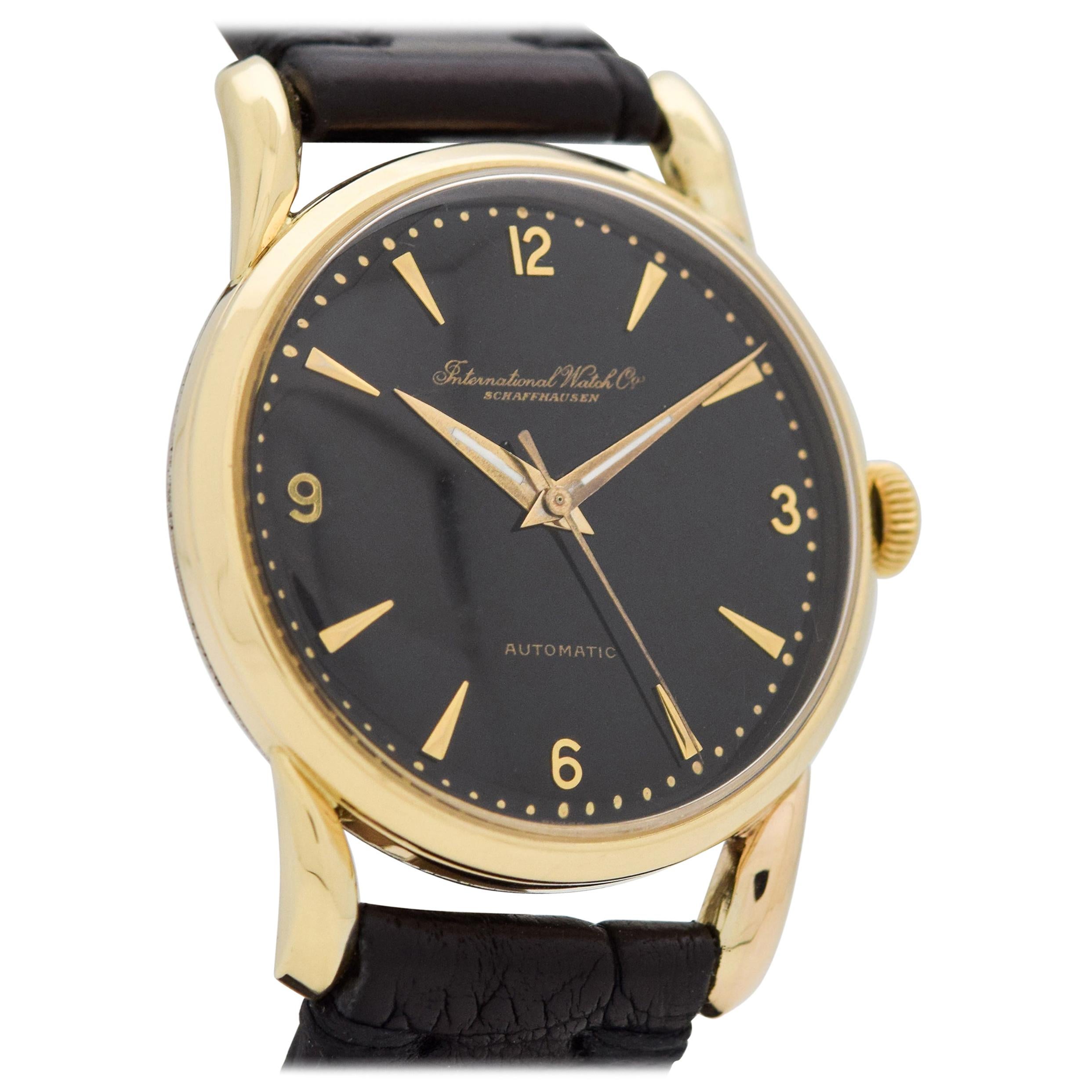Vintage IWC Automatic 18 Karat Yellow Gold Watch with a Black Dial, 1951 For Sale