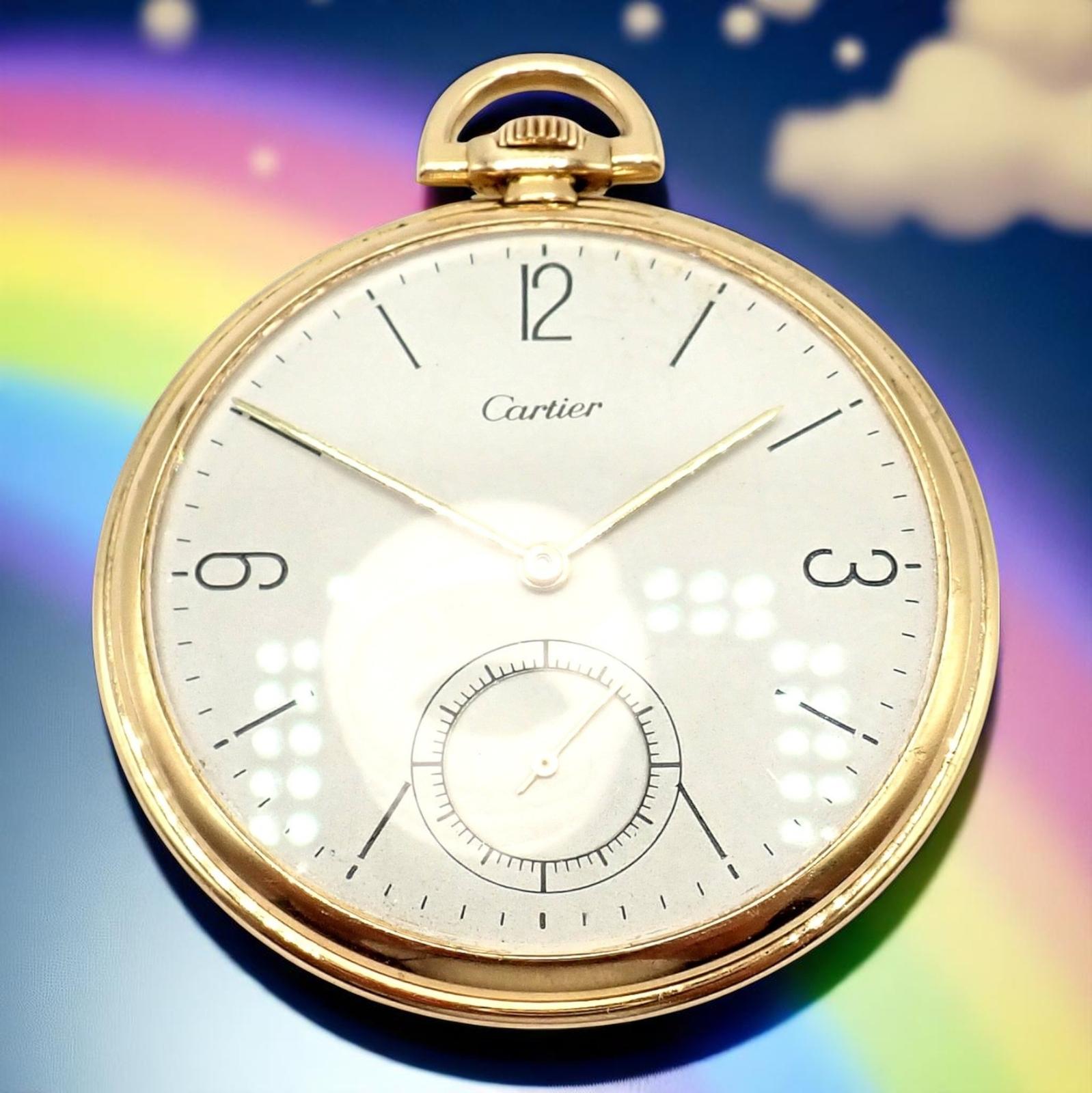 18k yellow gold pocket watch by IWC International Watch Co. for Cartier.
This elegant 1940s IWC for Cartier pocket watch is crafted in 18k yellow gold. 
Featuring a slim 46mm (19s) case, minimalist dial, and 19-jewel movement, it embodies refined