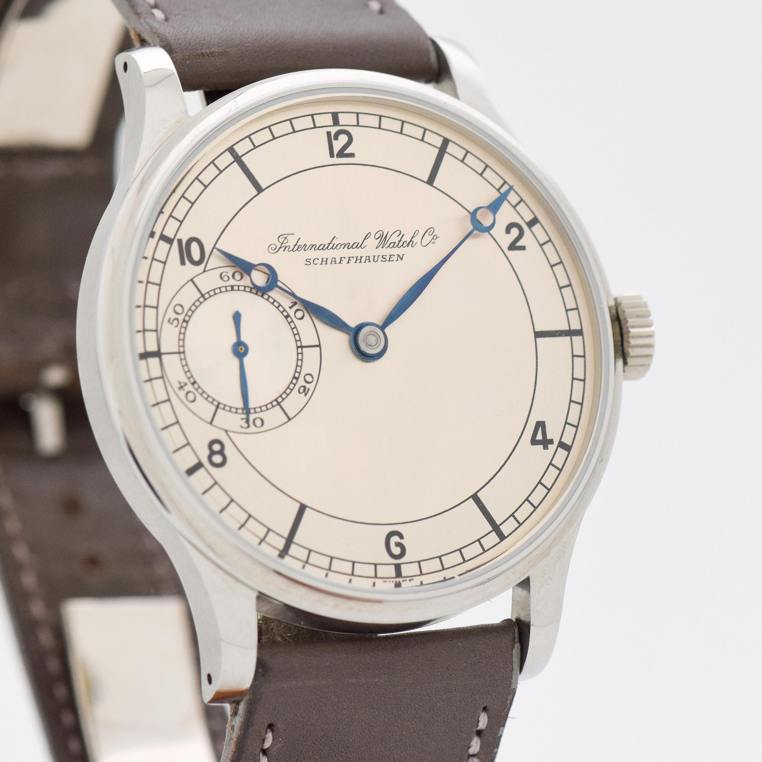 1926 Vintage International Watch Company Pocket Watch Converted to Wrist Watch New Stainless Steel Case with See Through Exhibition Case Back with Two Tone Gray and Silver Dial with Black Arabic Even Numbers. 42mm x 49mm lug to lug (1.65 in. x 1.93