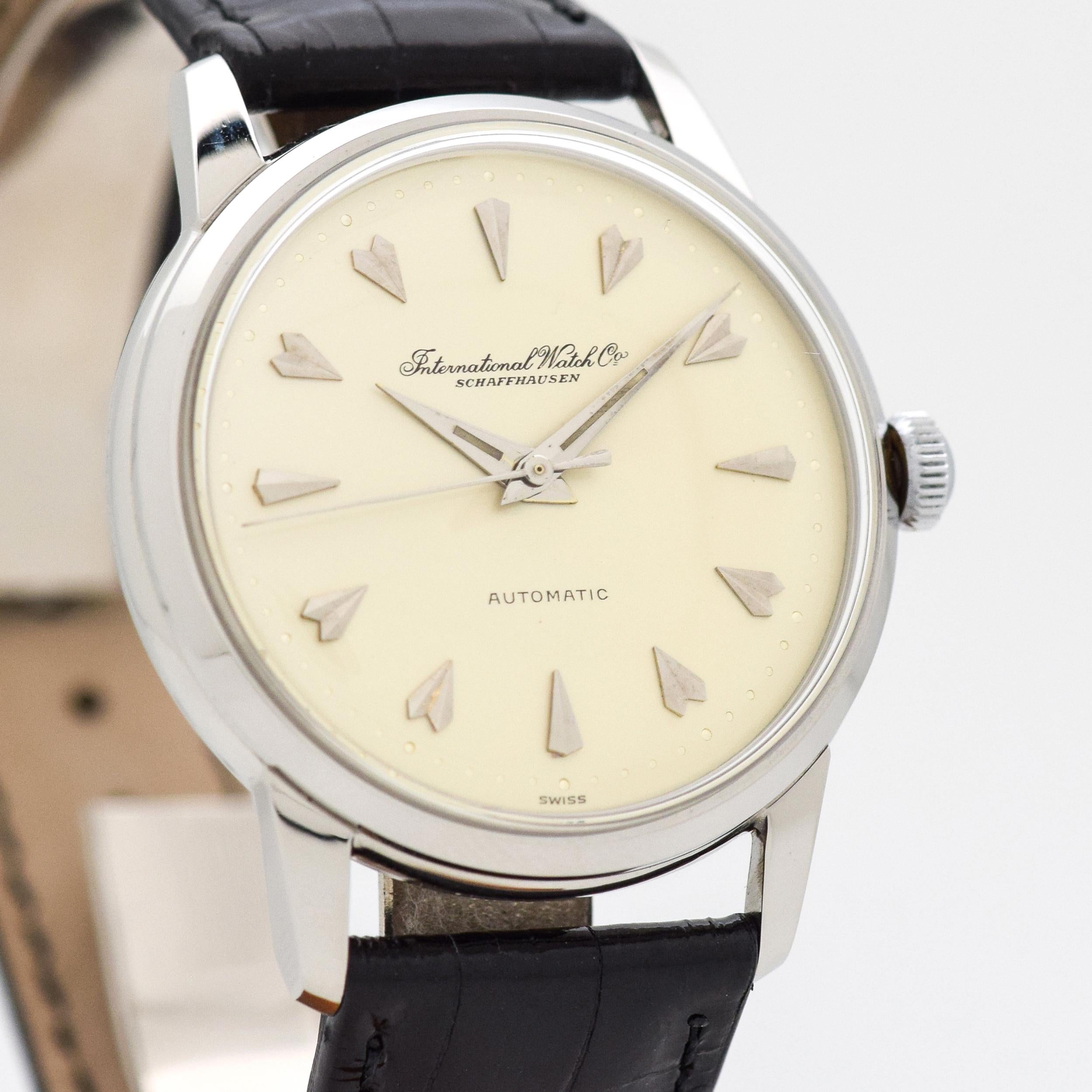 1957 Vintage International Watch Company (IWC) Automatic Cal. 852 Stainless Steel watch with Silver Dial with Applied Beveled Arrow Markers. 35mm x 42mm lug to lug (1.38 in. x 1.65 in.) - 21 jewel, automatic caliber movement. Featured on a 100%