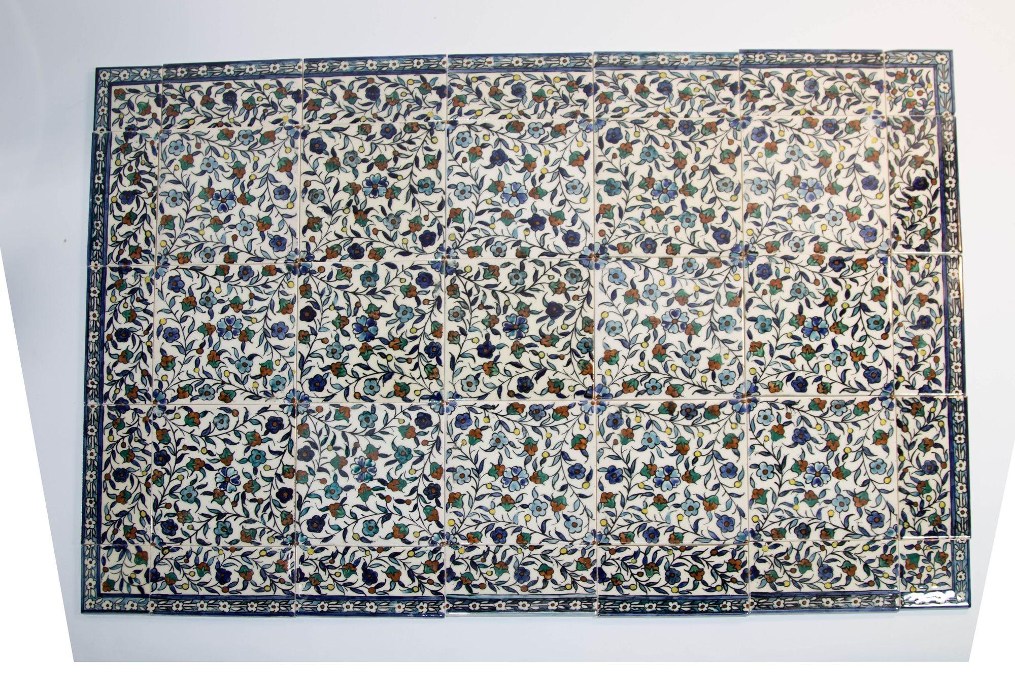 Vintage Iznik Islamic style porcelain tiles.
Hand painted set of 35 mural tiles in Moorish Islamic style Made in Italy.
Inspired by the Ottoman Imperial Mosque islamic wall tiles:
After the famous mural antique wall tiles in the Sultanahmet Mosque