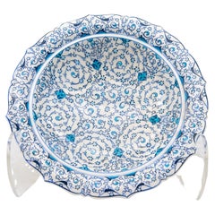 Piatto Iznik d'epoca in turchese, blu e crema, Turchia, inizio XX secolo.