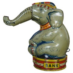 Tirelire mécanique vintage J Chein Tin Litho en forme d'éléphant de cirque
