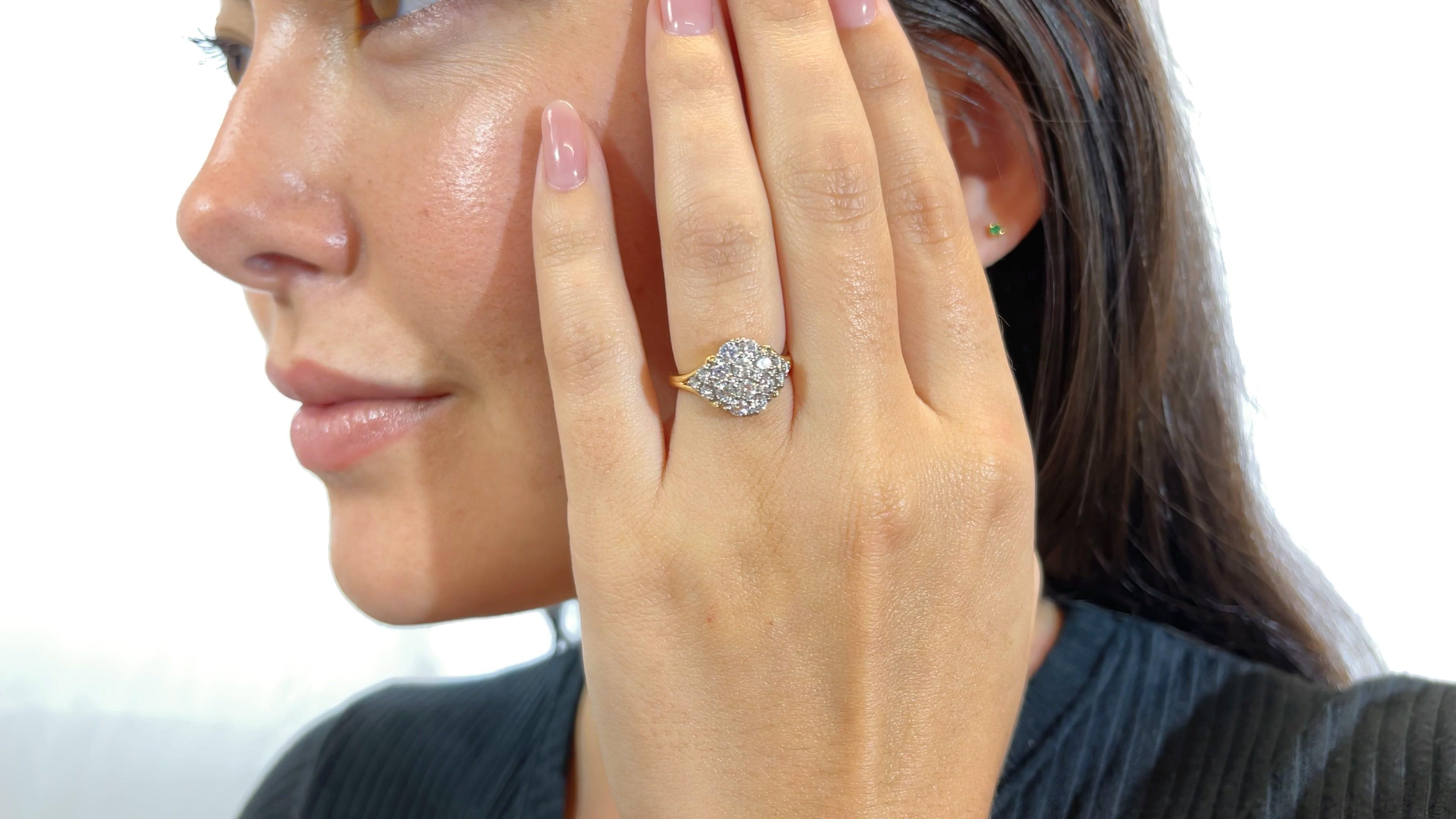 Vintage Jabel Diamond 18k Gold Cluster Ring. Featuring 16 Round Brilliant Cut diamonds approximately 1.00 carat  F-G color, VS clarity. Signed Jabel, with purity mark. Circa 1980s. Size 3 3/4 and can be resized. 

About The Piece: Are you fun,
