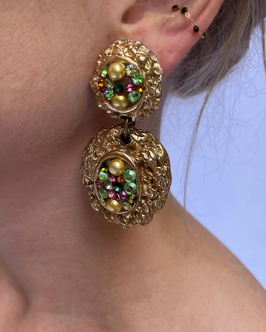 The only thing cooler than this earring is the fact that there is only one of them! HOW chic?! Wear them with just a tiny little stud or gold huggie in the other ear. These earrings feature a brushed gold surface, textured with swirling, and set
