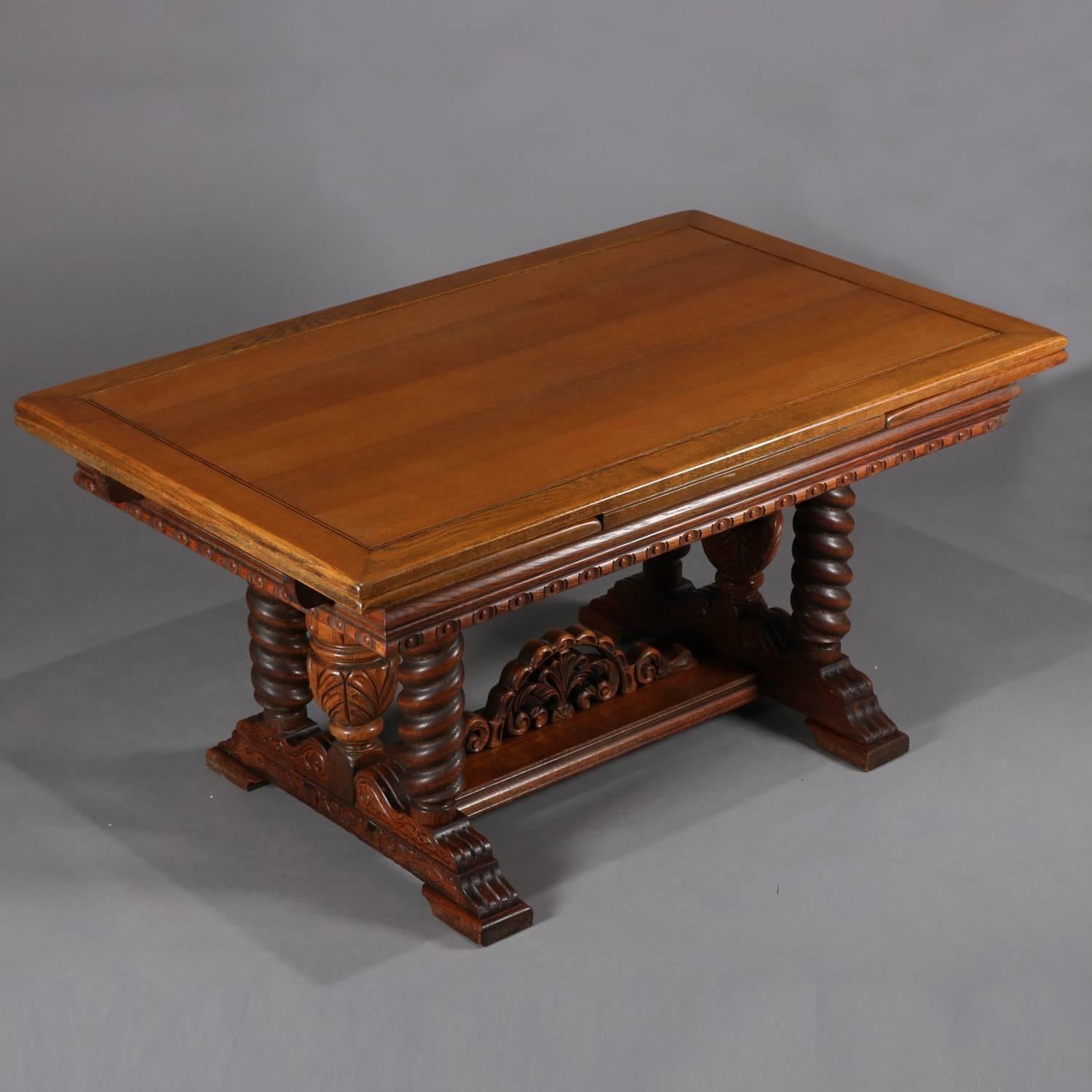 Vintage Jacobean heavily carved oak refractory dining table features heavily carved oak frame with scroll and foliate decoration, top with egg and dart trim over trestle base with central carved acanthus column flanked by carved barley twist