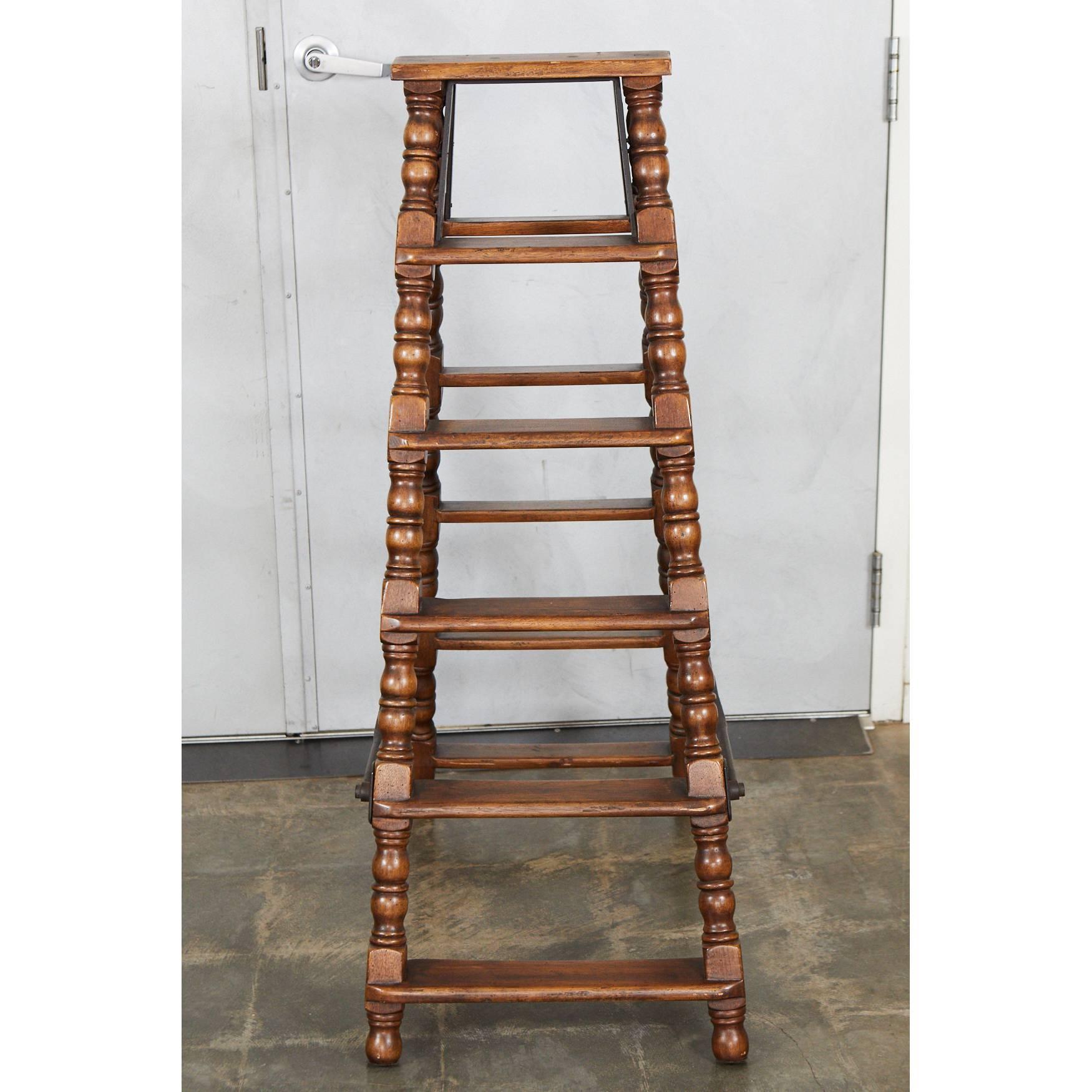 We believe this ladder was made 1950s in the Jacobean style with nicely turned elements. The ladder has solid construction and an elegant design. The iron hinges are very well made and add to the great look of the piece.

      