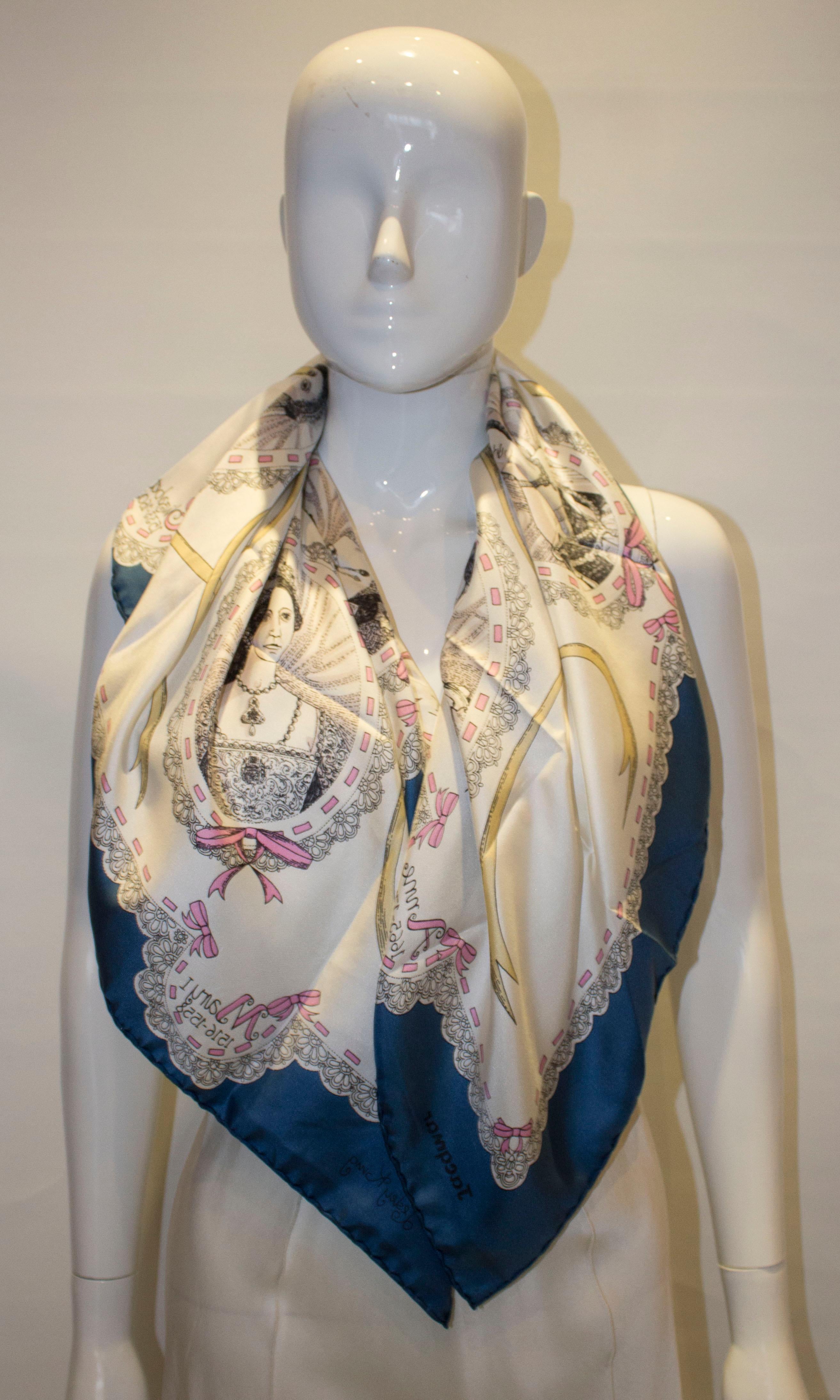 A fun vintage silk scarf by Jacqumar. The scarf has a design showing various British Queens , and has a blue hand rolled border. Measurements: 34'' square.
