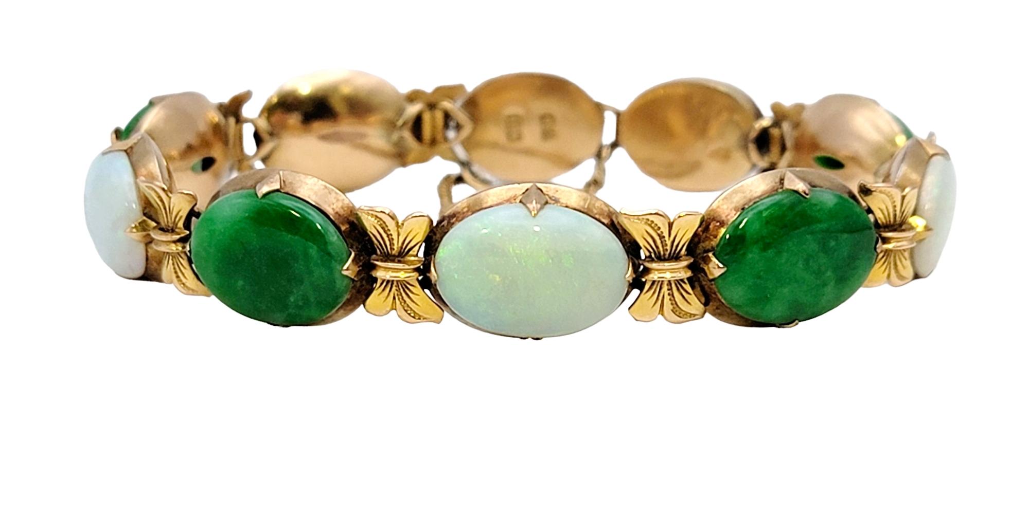 We are absolutely in love with this vintage gem! The incredible rich colors, fine detailing and Old World charm make this stunning bracelet a true keepsake. 

This lovely line bracelet features 4 oval cabochon jade stones and 4 oval cabochon white