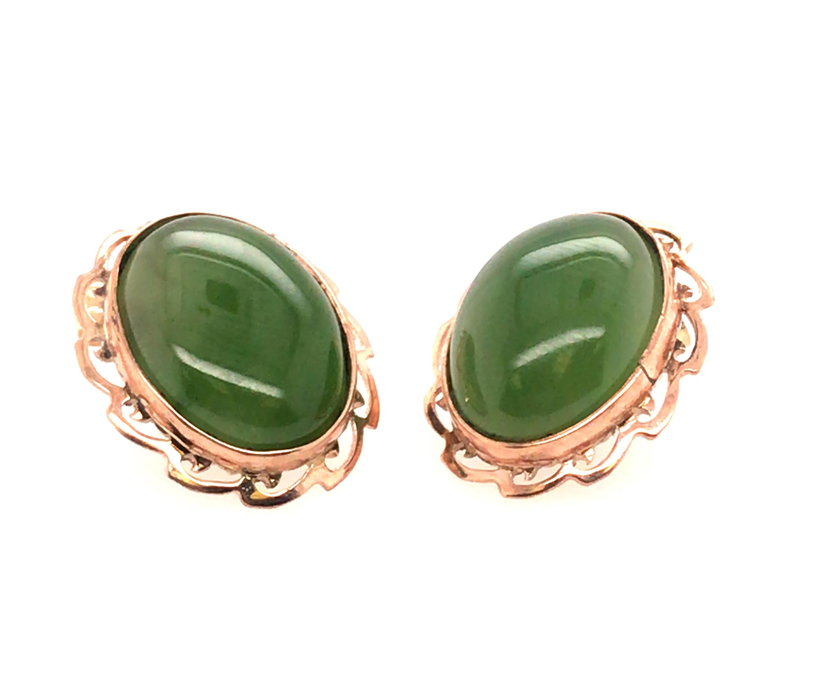 Antique Vintage Retro Mid Century Jade 14K Yellow Gold Earrings



Featuring 2 Beautiful Natural 16 x 13.5mm Oval Cabochon Translucent Jade Gemstones

100% Natural Gemstones  

Solid 14K Yellow Gold

Simple Yet Elegant 

Hand Cut Gold

Circa