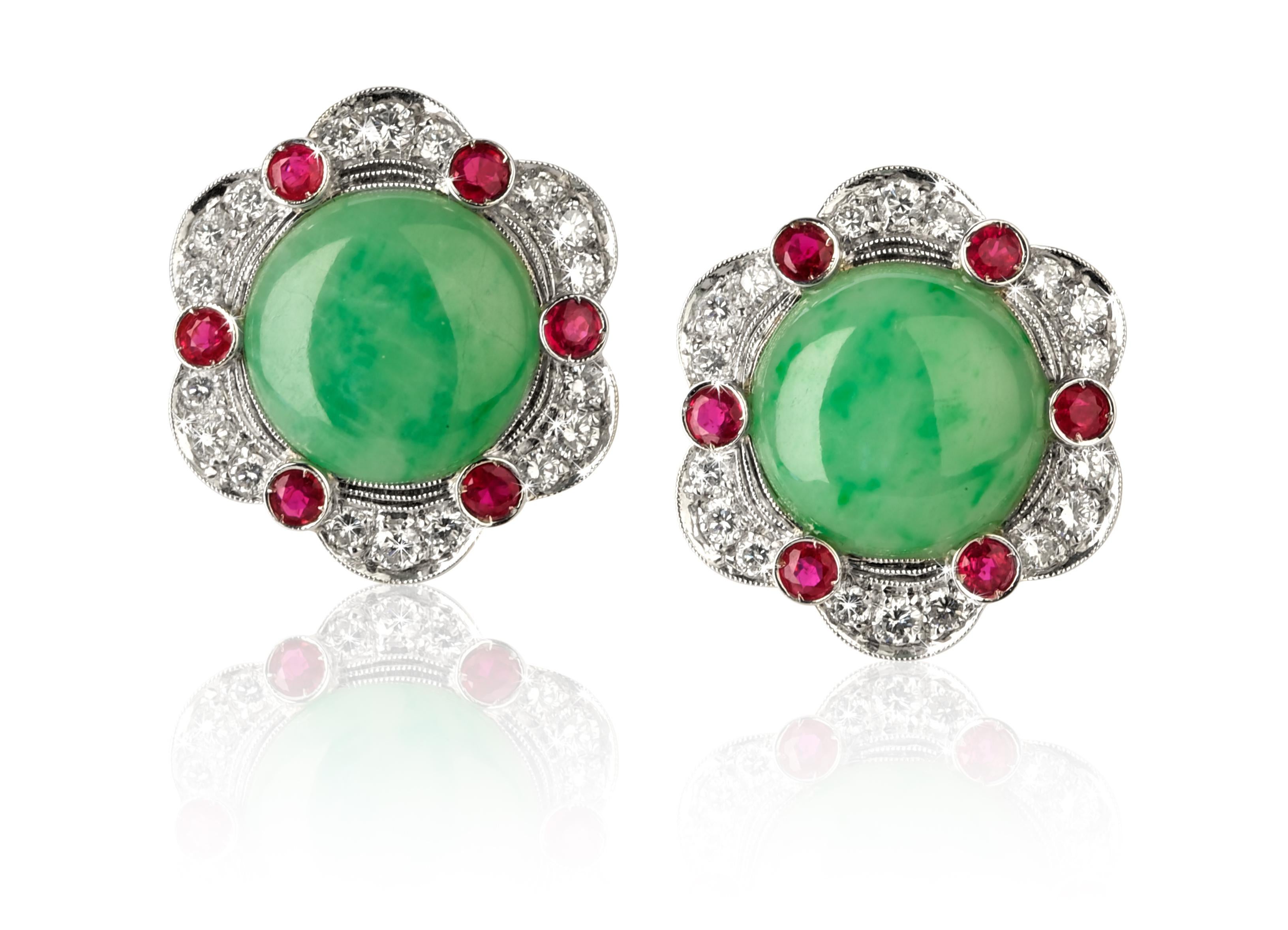 Vintage Jade Earrings From ANGELETTI PRIVATE COLLECTION White gold 18kt with Diamonds ct. 1.55 and Ruby ct. 1.42.
The Earrings were manufactured in ‘60s in Italy by expert Goldsmith from Rome.
The Jade is A quality Cabochon. The Round Rubies ct.