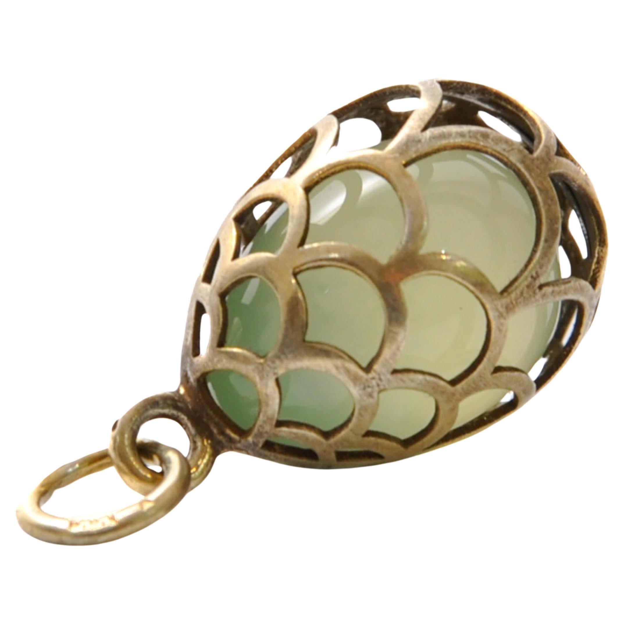 Vintage Jade Egg Pendant Caged in Silver Gilt Frame For Sale