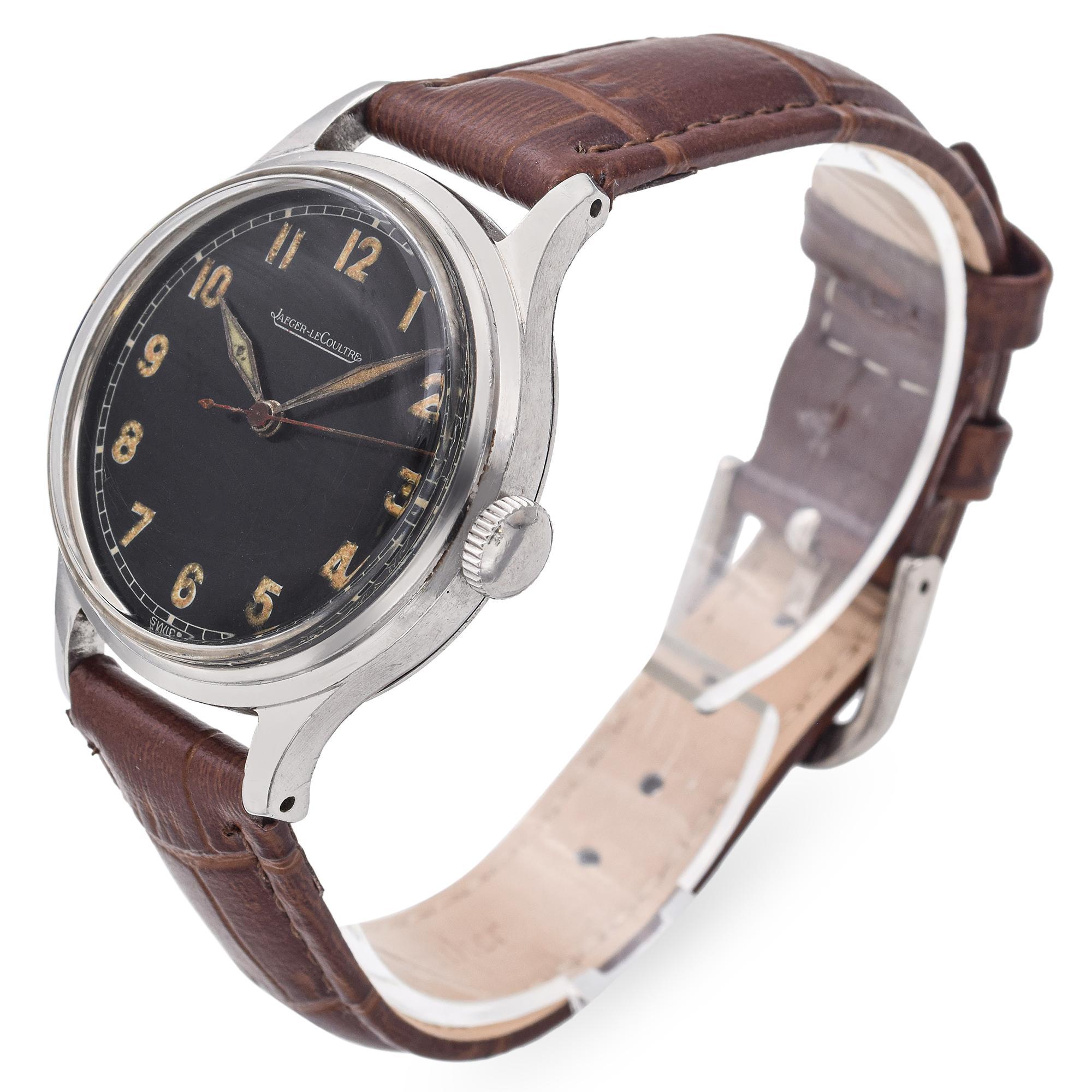 This vintage Jaeger-LeCoultre stainless steel men's hand-wind watch showcases the brand's renowned precision and timeless design. Encased in sleek stainless steel, it features a clean, classic dial with minimalist hour markers and a refined
