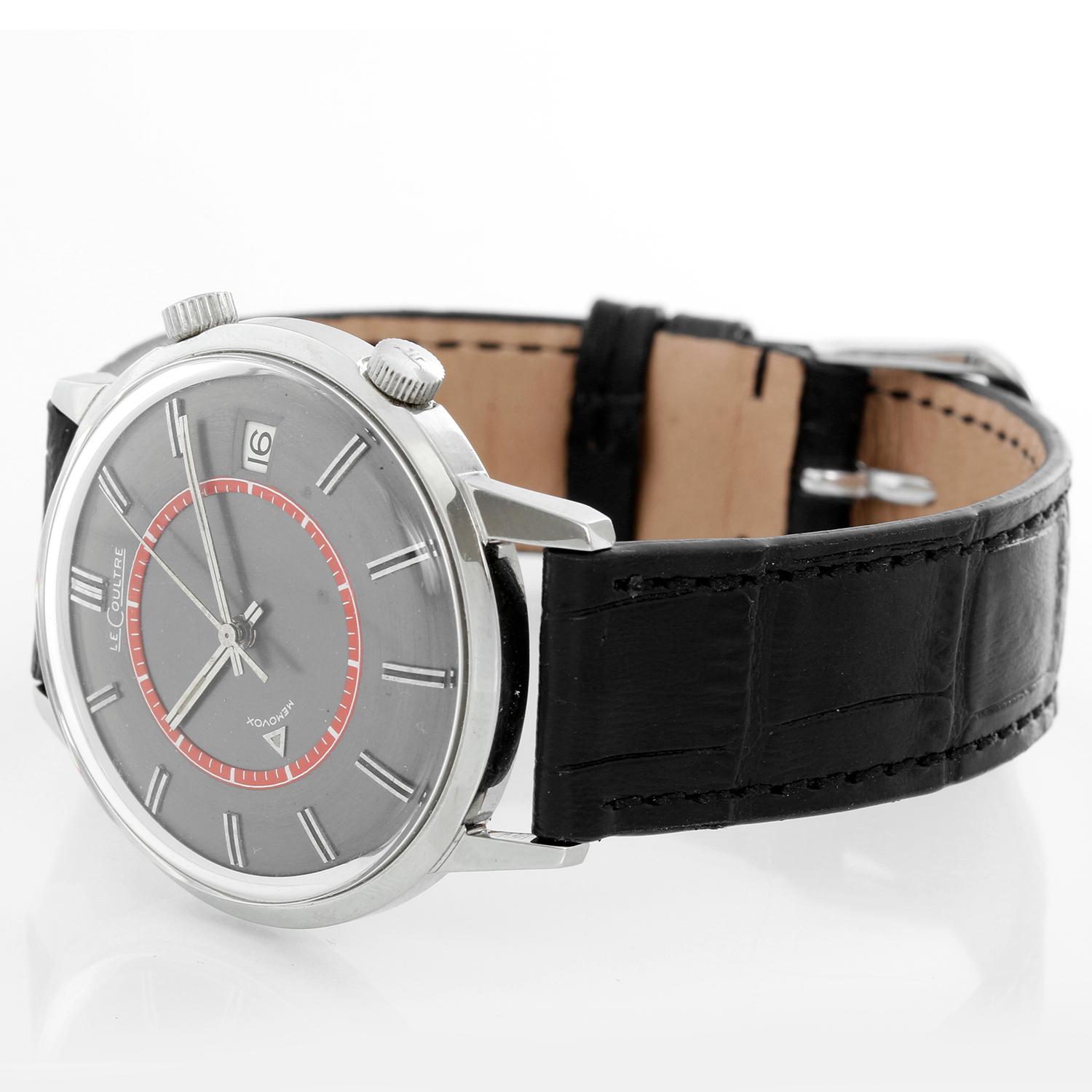 Vintage Jaeger-LeCoultre Stainless Steel Memovox Watch - Manual winding. Stainless Steel ( 37 mm ). Grey  dial with red sub dial and double stick hour markers; date and alarm. Black leather strap with tang buckle. pre-owned with custom box. Circa