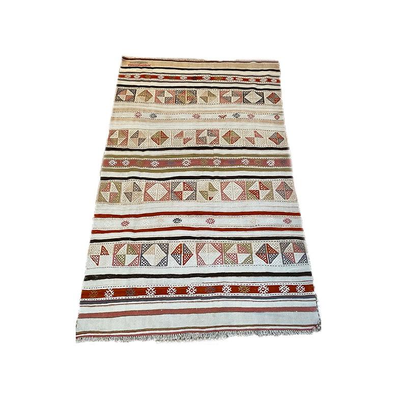 Vintage Turkish jajim handcrafted circa 1950’s.

7′ x 4’6″

 

k6336

 

Jajim is a thin, handmade carpet full of pattern and woven horizontally. The name is derived from the compound word “Jiji” meaning beautiful and full of figures. The history of
