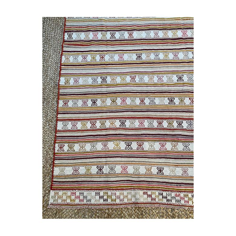 Vintage handcrafted jajim, circa 1950’s. Charming colors and cheery pattern.

7’5″ x 5’8″

 

k6334

 

Jajim is a thin, handmade carpet full of pattern and woven horizontally. The name is derived from the compound word “Jiji” meaning beautiful and