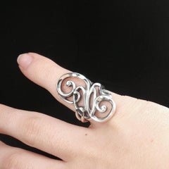 Anillo vintage de James Avery en plata de ley 925 con diseño de volutas y calado, talla 4,75
