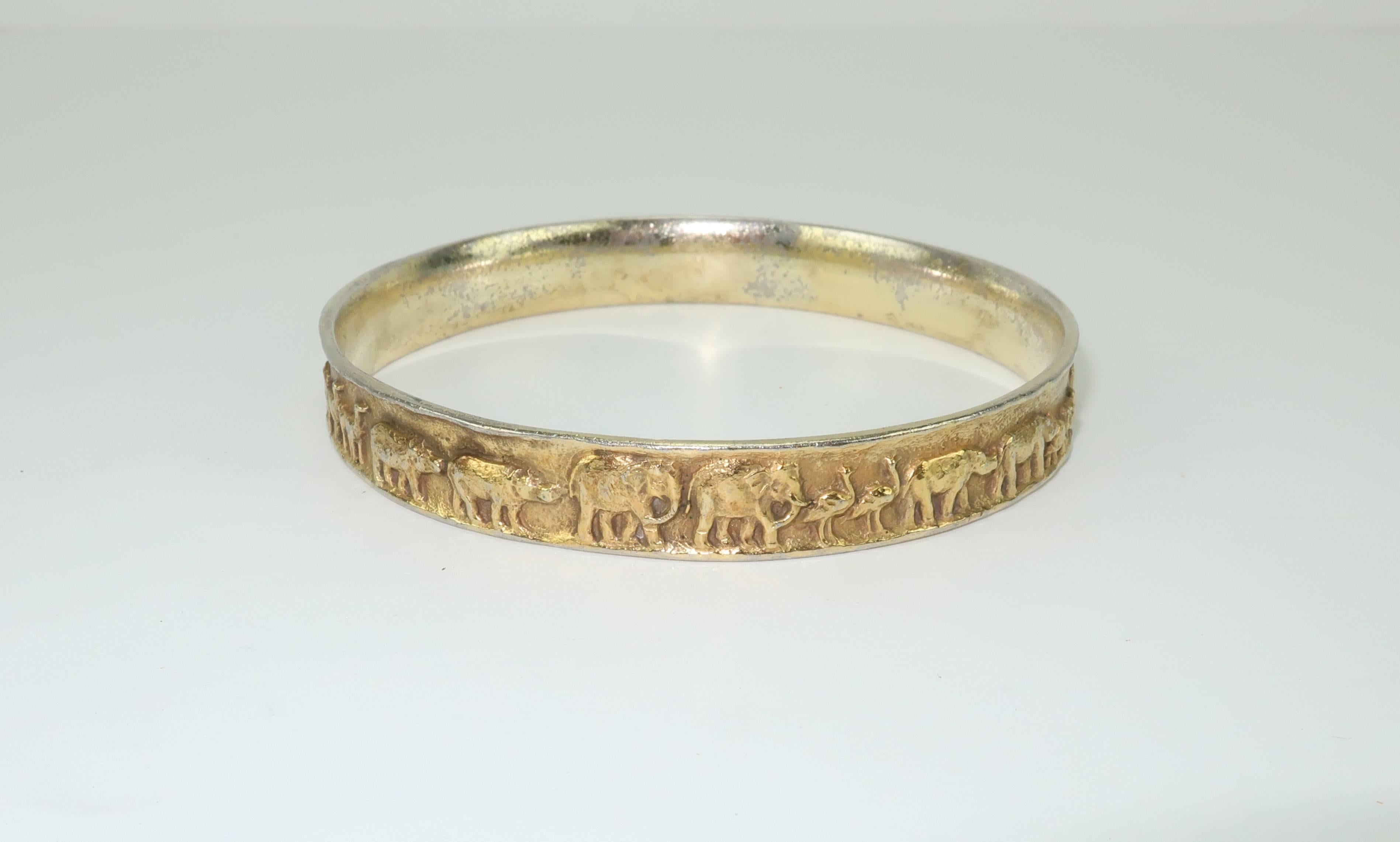 It is a parade of twosies around this sterling silver vermeil bangle bracelet from James Avery of Texas.  A family owned workshop of artisans, James Avery has been designing jewelry since the 1950’s often with religious themes and symbolism and