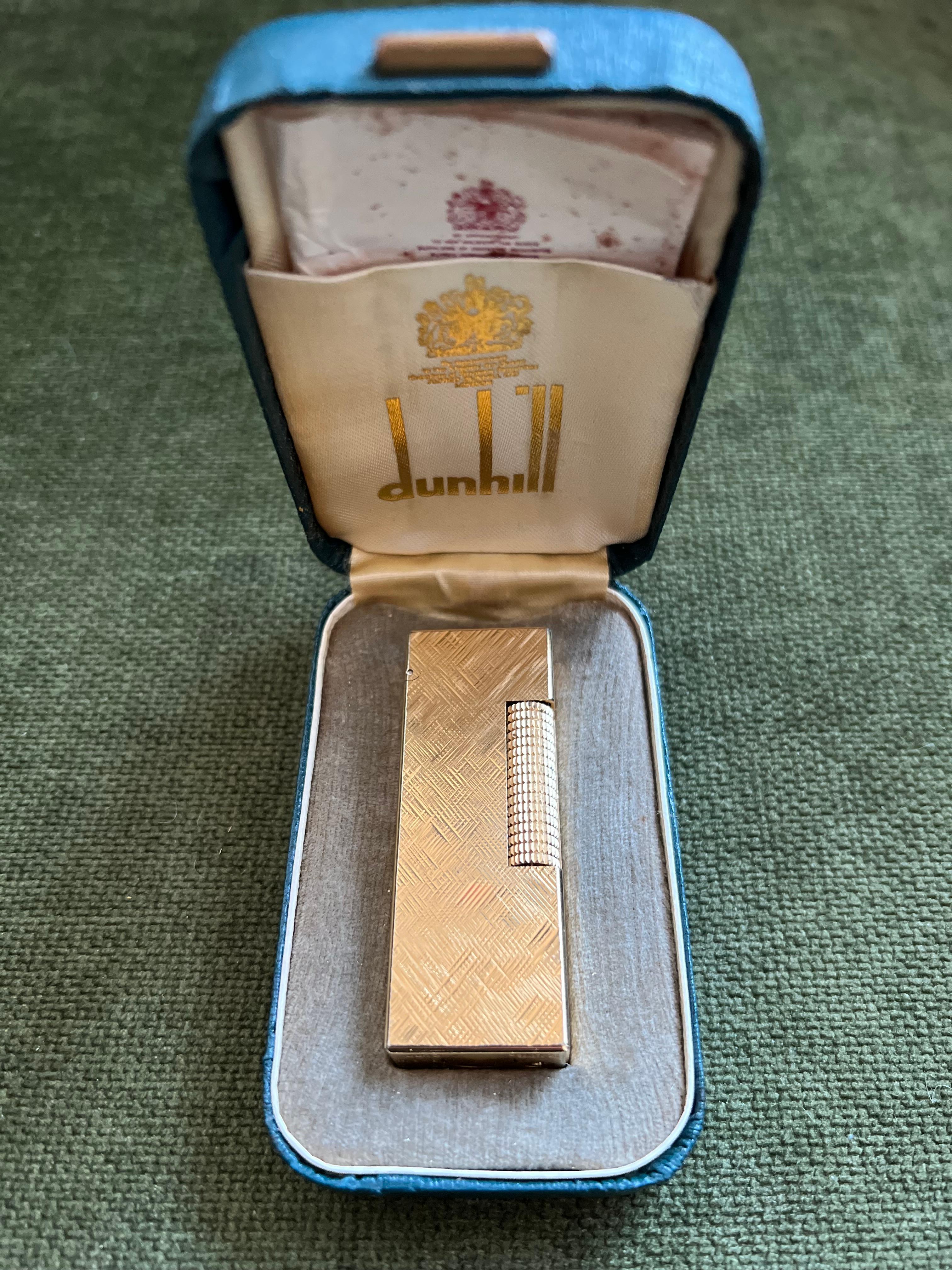 Vintage “ James Bond” Dunhill Gold Plated Lighter Original Sky Case, Circa 1970

Rare Vintage Dunhill gold plated Swiss Made lighter In mint condition.
Works perfectly. 
Iconic and beautifully engineered piece with rare lacquer condition.
In
