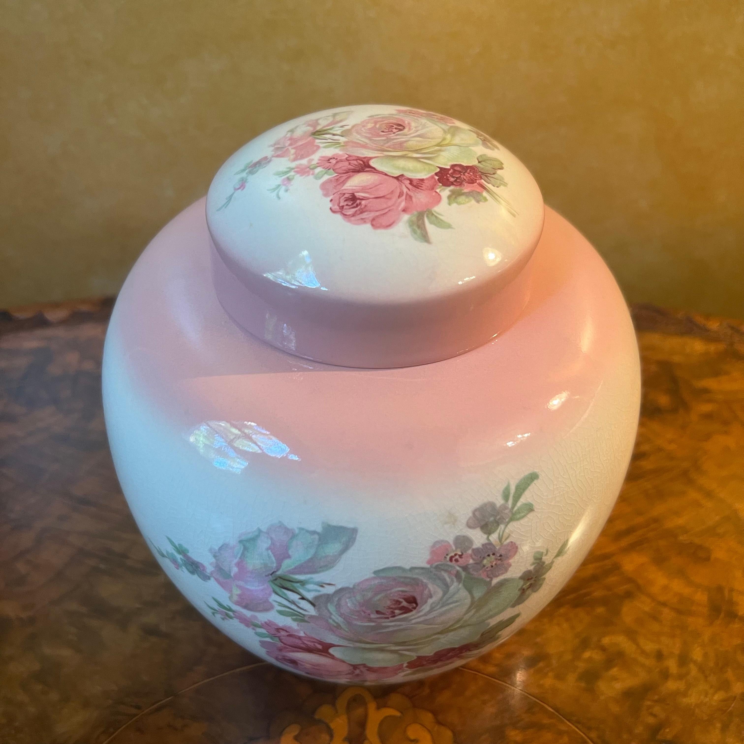 Pink with posy print centre, crazing, stamped James Kent Old Foley Victoria Rose.

Circa: 1950s

Material: Porcelain  

Country Of Origin: England   

Measurements: 16cm high, 7.5cm diameter of top opening, 15cm mid diameter  

Postage via Australia