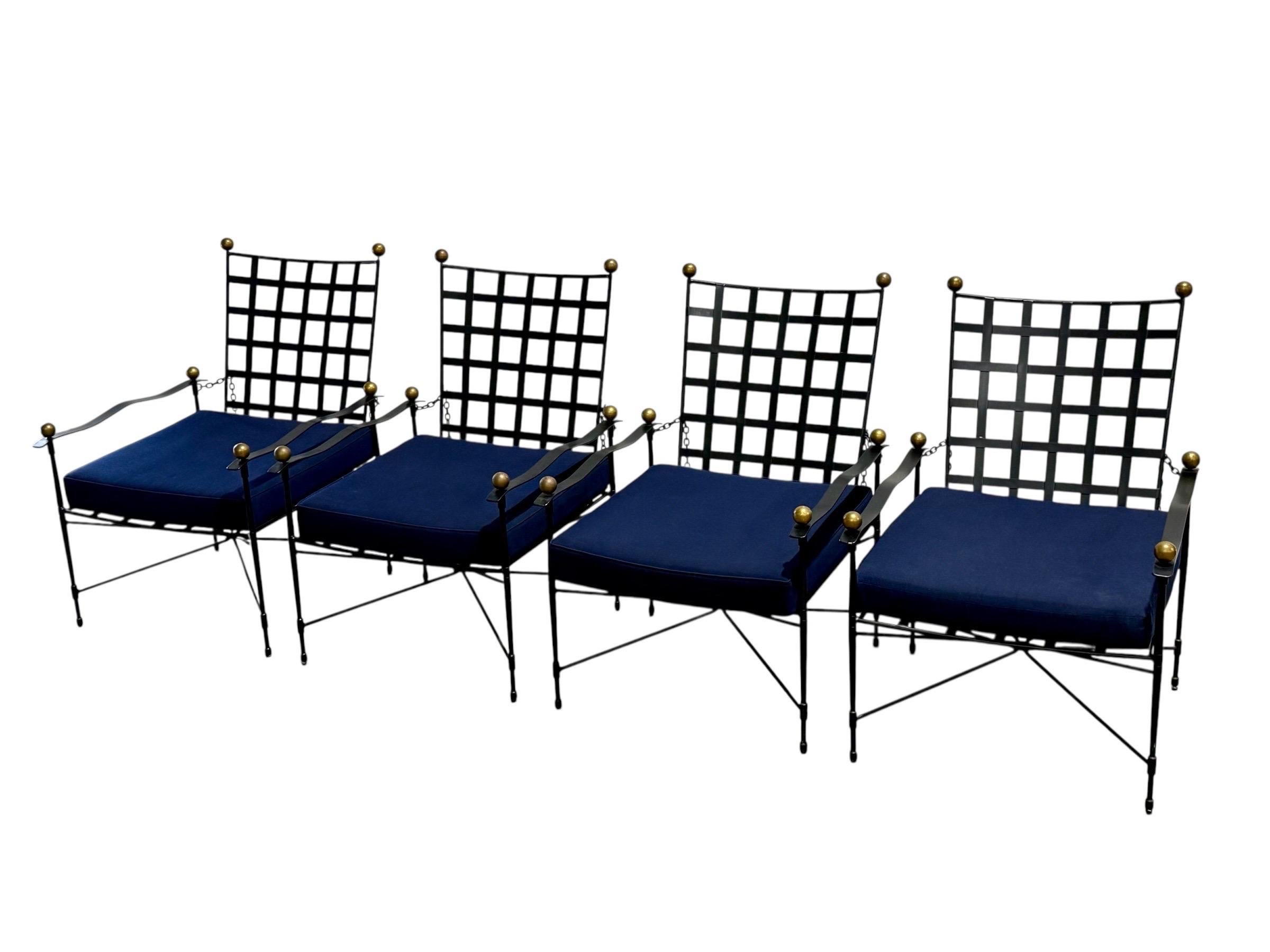 Janus et Cie Amalfi lounge chairs, circa 2000s. 
- SET of FOUR -
Iconic iron garden loungers after Mario Papperzini for John Salterini and inspired by ancient Etruscan designs. 
Adjustable back rests. Steel frames with powder coat finish. Brass tone