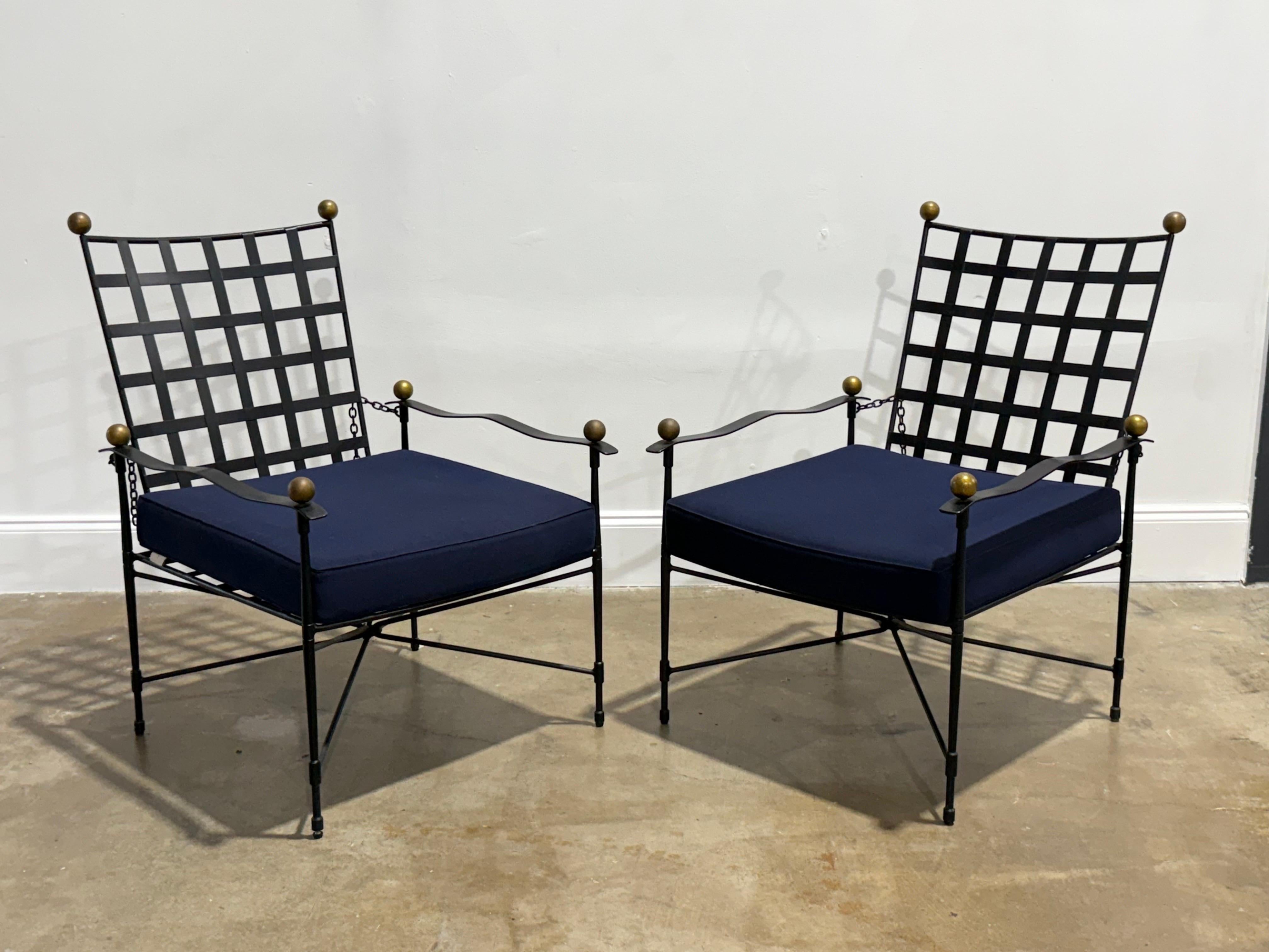 Janus et Cie Amalfi lounge chairs, circa 2000s. 
This listing is for one (1) chair
Iconic iron garden loungers after Mario Papperzini for John Salterini and inspired by ancient Etruscan designs. 
Adjustable back rests. Steel frames with powder coat