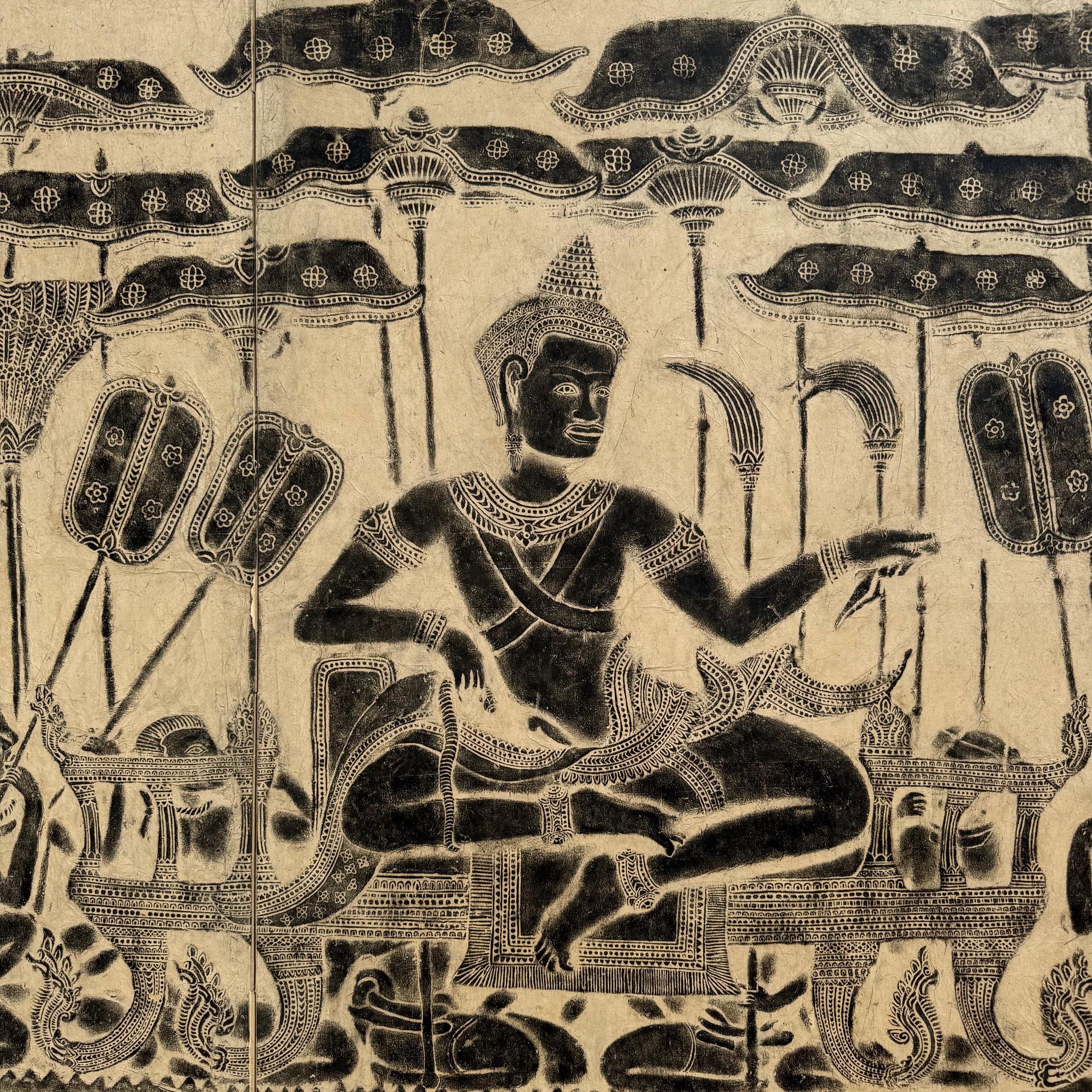 Vintage Japanese 2-panel screen of a Khmer rubbing. The large rubbing taken from the bas-relief carvings on the first tier southern gallery of the Angkor Wat  temple complex in Siem Reap, Cambodia. The scene of  Suryavarman II (1113 - 1150), the