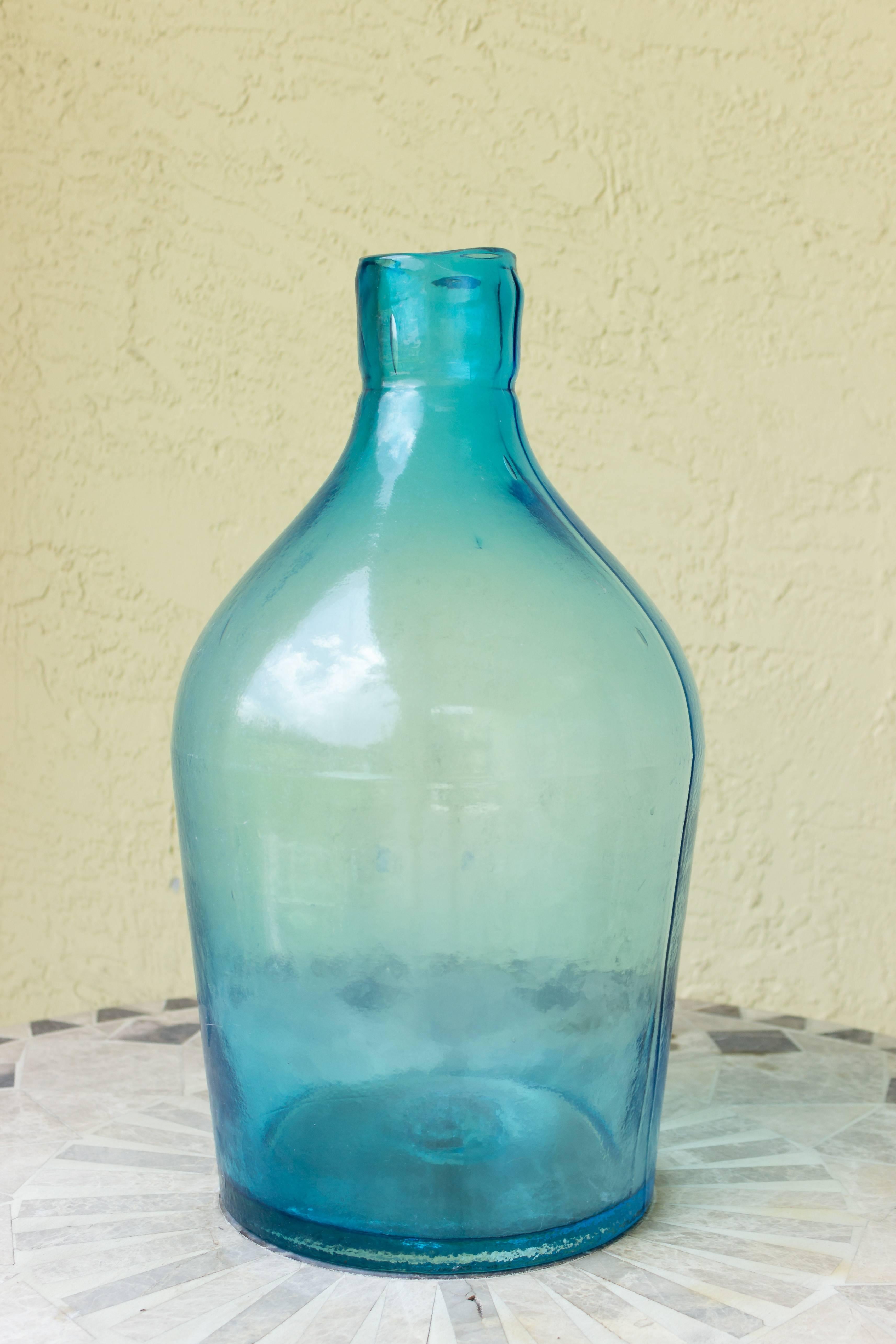 large blue glass bottles