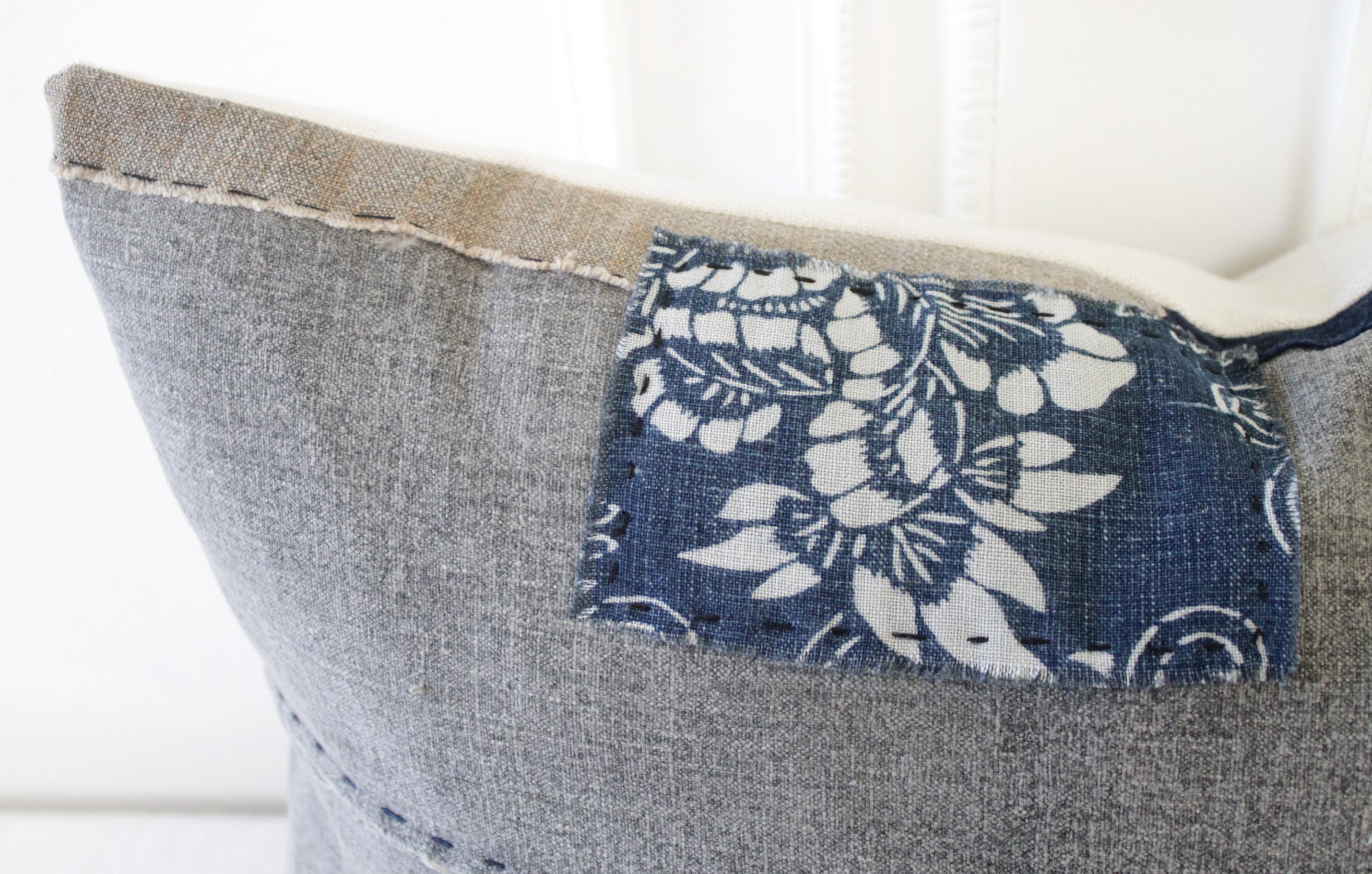 Vintage Japanese Boro textile accent lumbar pillow with patchwork
Beautiful custom designed in our Full Bloom Cottage Studio, this vintage Japanese textile is a medium gray color with original patchwork in a natural linen color, and we've kept and