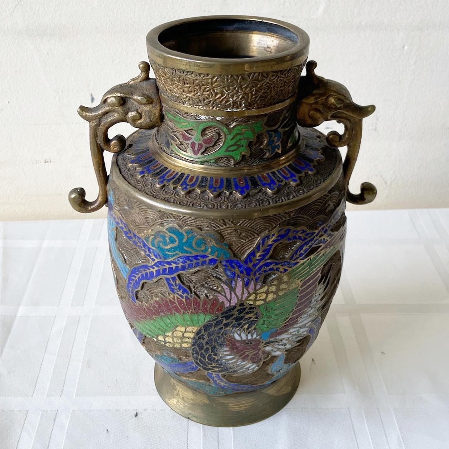 Amazing early 20th century Japanese brass champleve vases features a vibrant colorful enamel design depicting dragons.
 