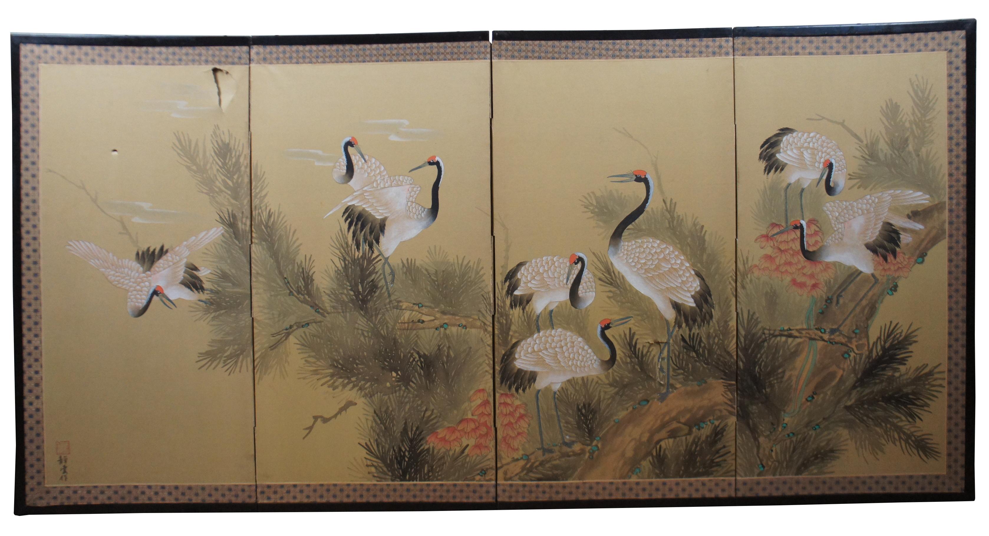 Vintage Japanese chinoiserie four panel thick paper room screen showing a gnarled pine tree inhabited by eight cranes; signed by the artist in the lower left corner, bordered in embroidered silk, and framed in lacquered wood. Measure: 70”.
        