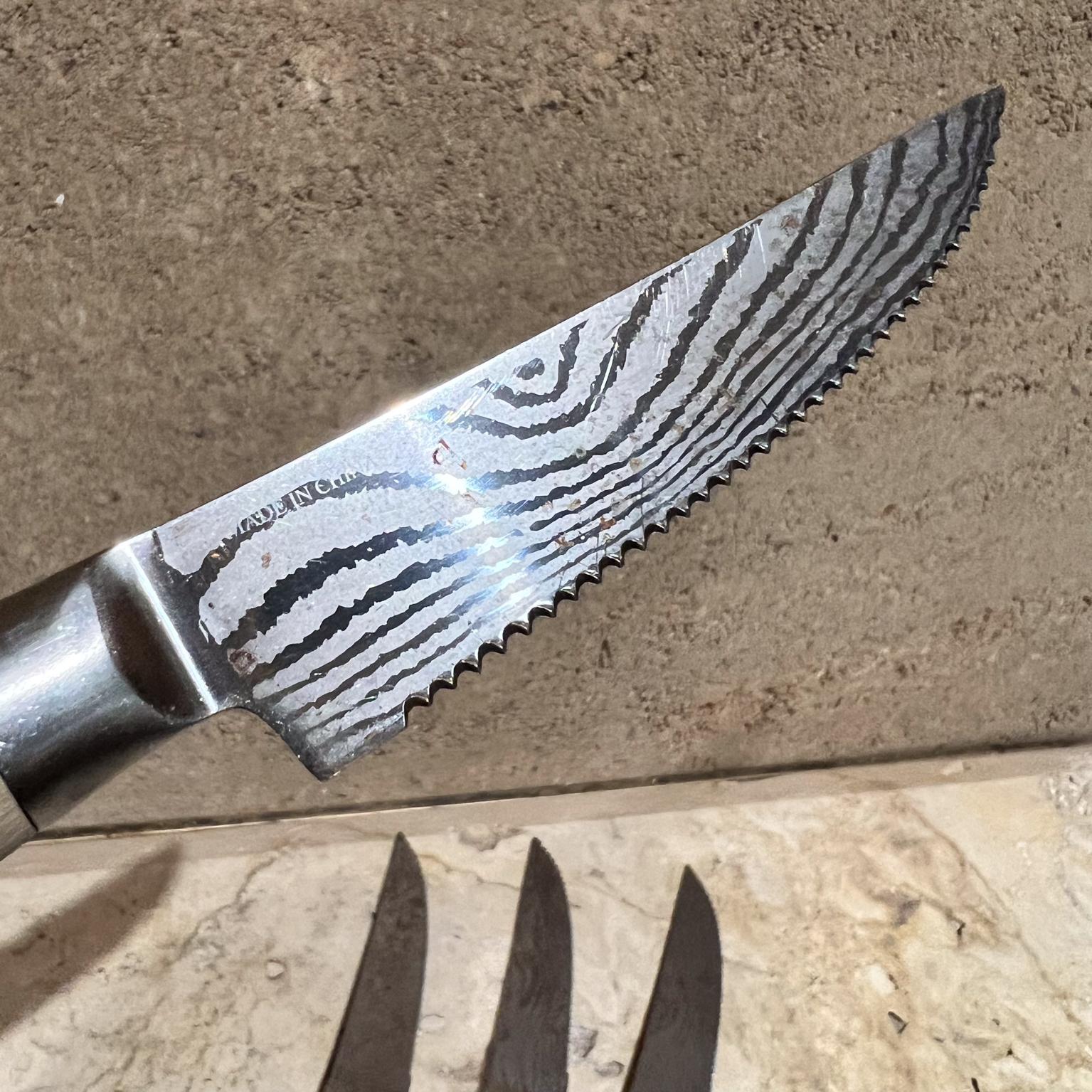 Vintage 4-piece Japanese Damascus Steel Steak Knife Set
.5 h x 8.5 long x 1 w
Preowned original vintage, refer to images