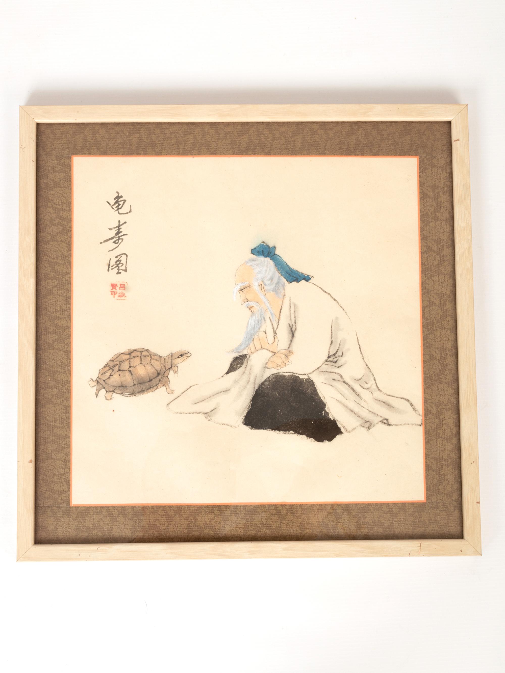 A vintage Japanese drawing depicting an 'Old Man and Turtle' framed and mounted in silk brocade. Dating from C.1980.
Presented in excellent vintage condition.
